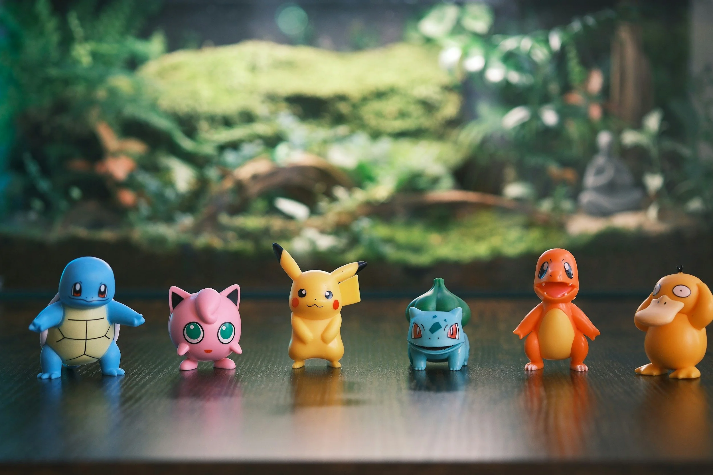 Pokémon character figures displayed in a row