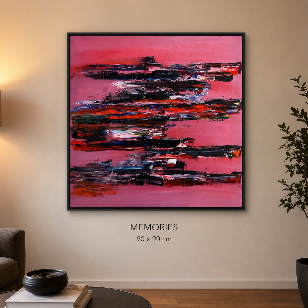 Abstract landscape painting with shades of pink, red, black, and white, titled 'MEMORIES,' 90 x 90 cm, hanging on a beige wall in a living room.