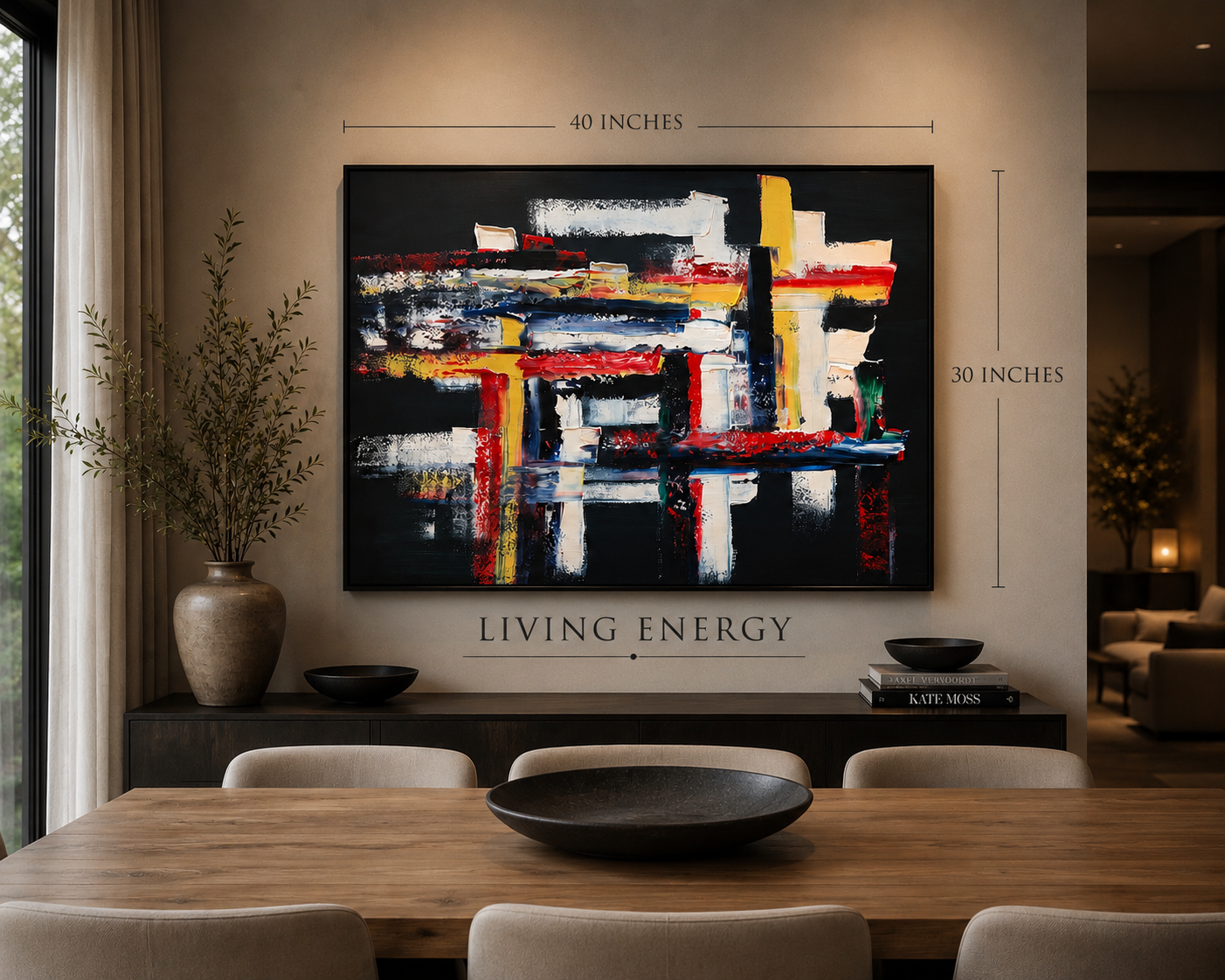 Contemporary living room with abstract colorful artwork on the wall, measuring 40 inches by 30 inches, titled 'Living Energy.' The room has a wooden dining table with beige chairs, a large potted plant, and decorative bowls on a dark sideboard. Natur