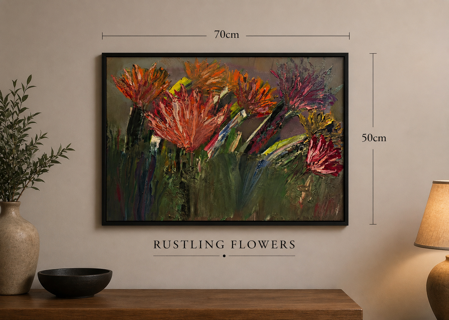 A framed abstract painting of colorful, textured flowers hanging on a wall with measurements of 70cm by 50cm. The painting is titled "Rustling Flowers" and is displayed above a wooden table with a potted plant, a black bowl, and a lamp nearby.