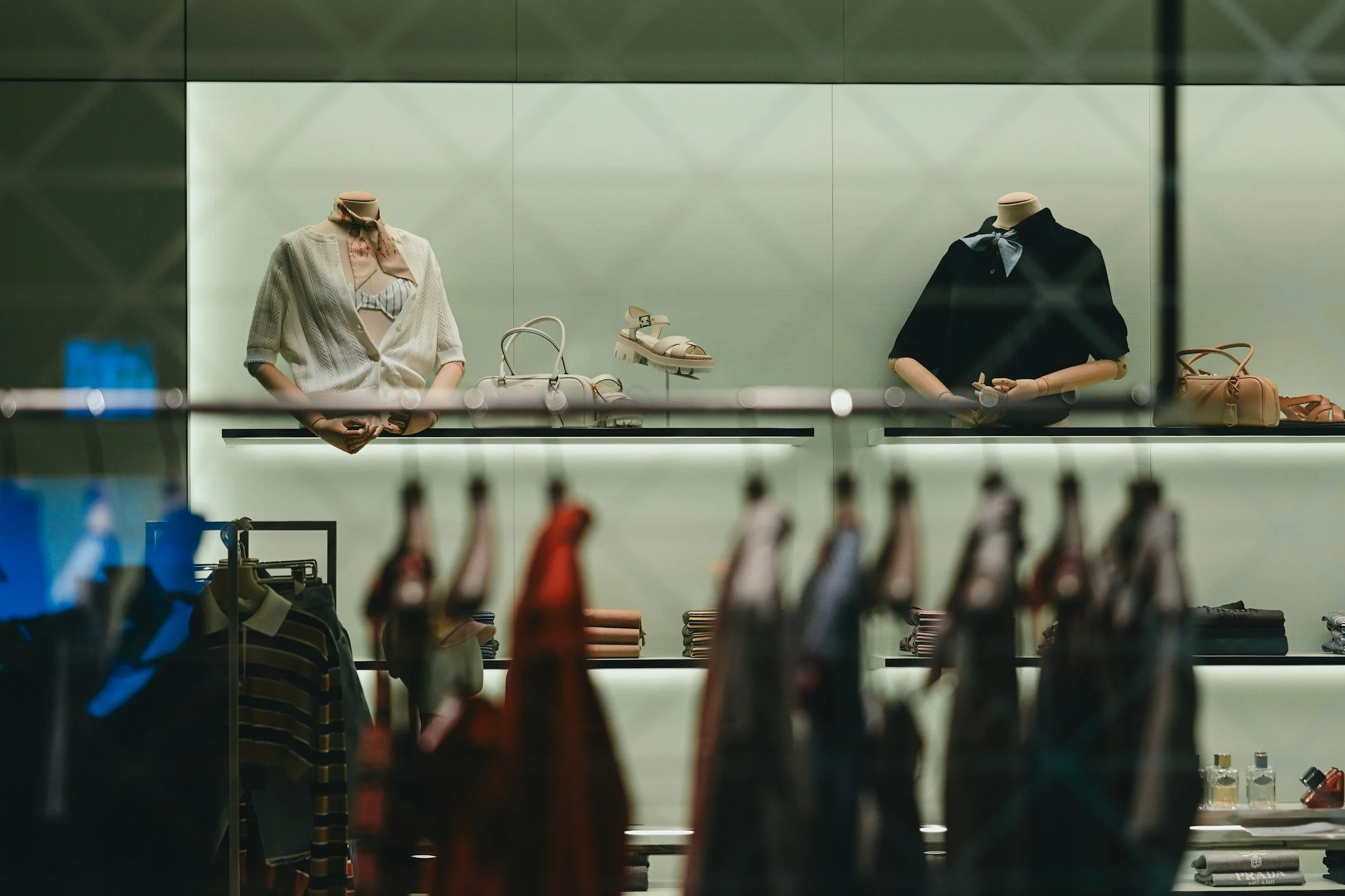 Clothing and accessories displayed in a retail store.