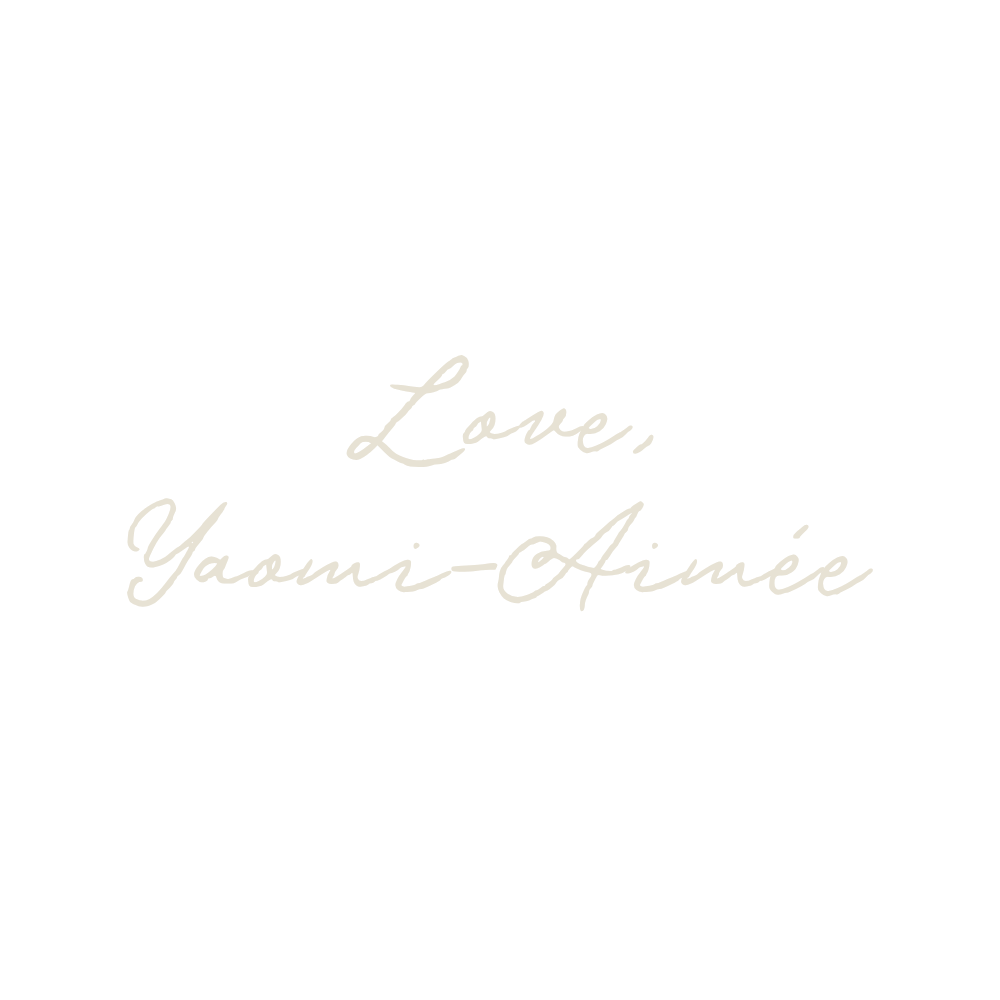 Black background with white handwritten text that says, "Love, Yaoui-Aimée."