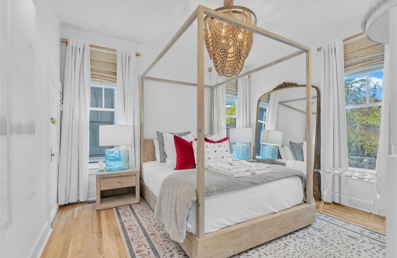 retreat style master bedroom at Pink Firefly Cottage Lake Eufaula vacation rental Carlton Landing