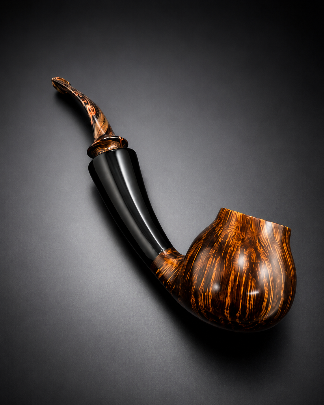 A smoking pipe with a black stem and a brown, marbled bowl and mouthpiece, placed on a dark surface.