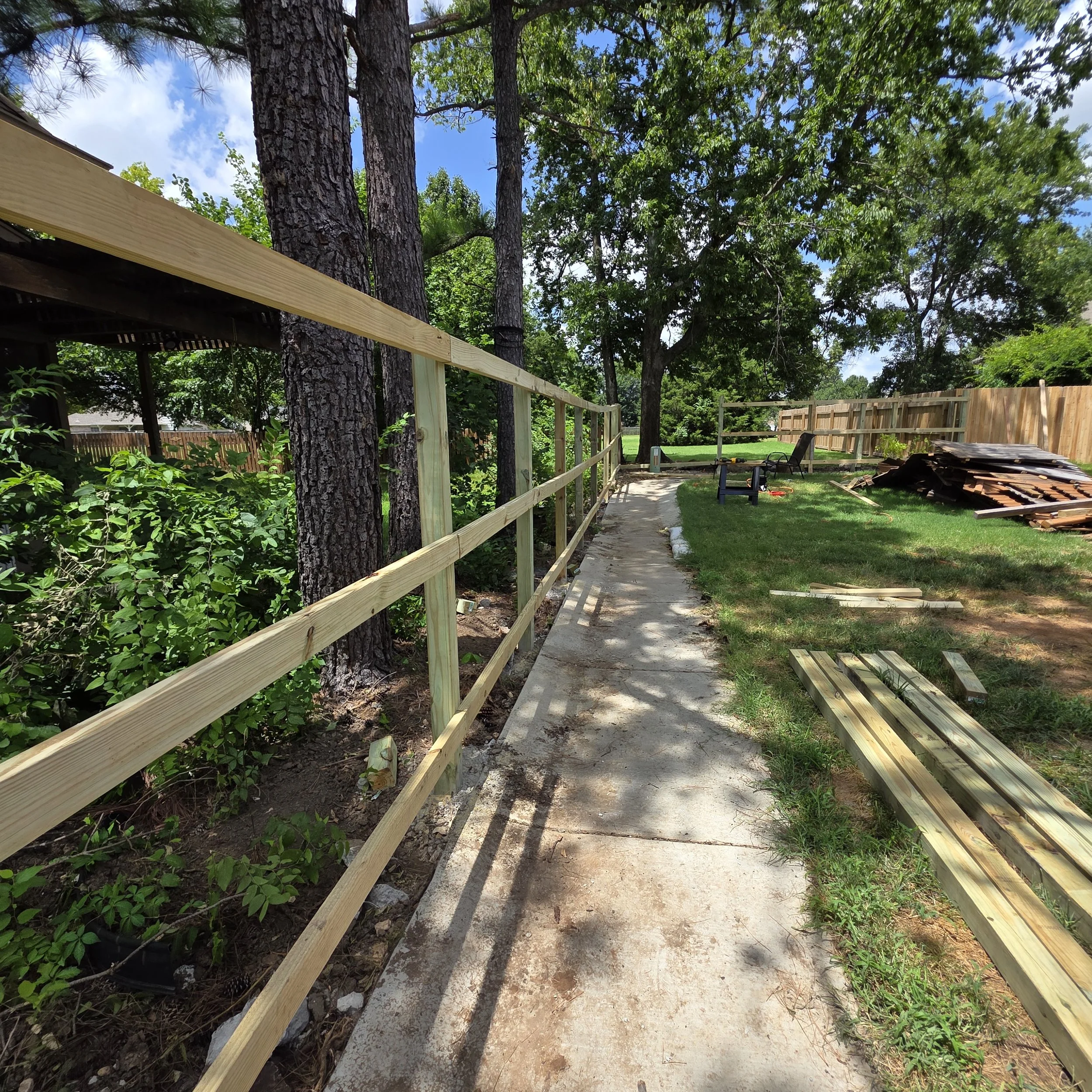 Wood privacy fence installation in progress by The Fence Guy in the Tulsa, OK area