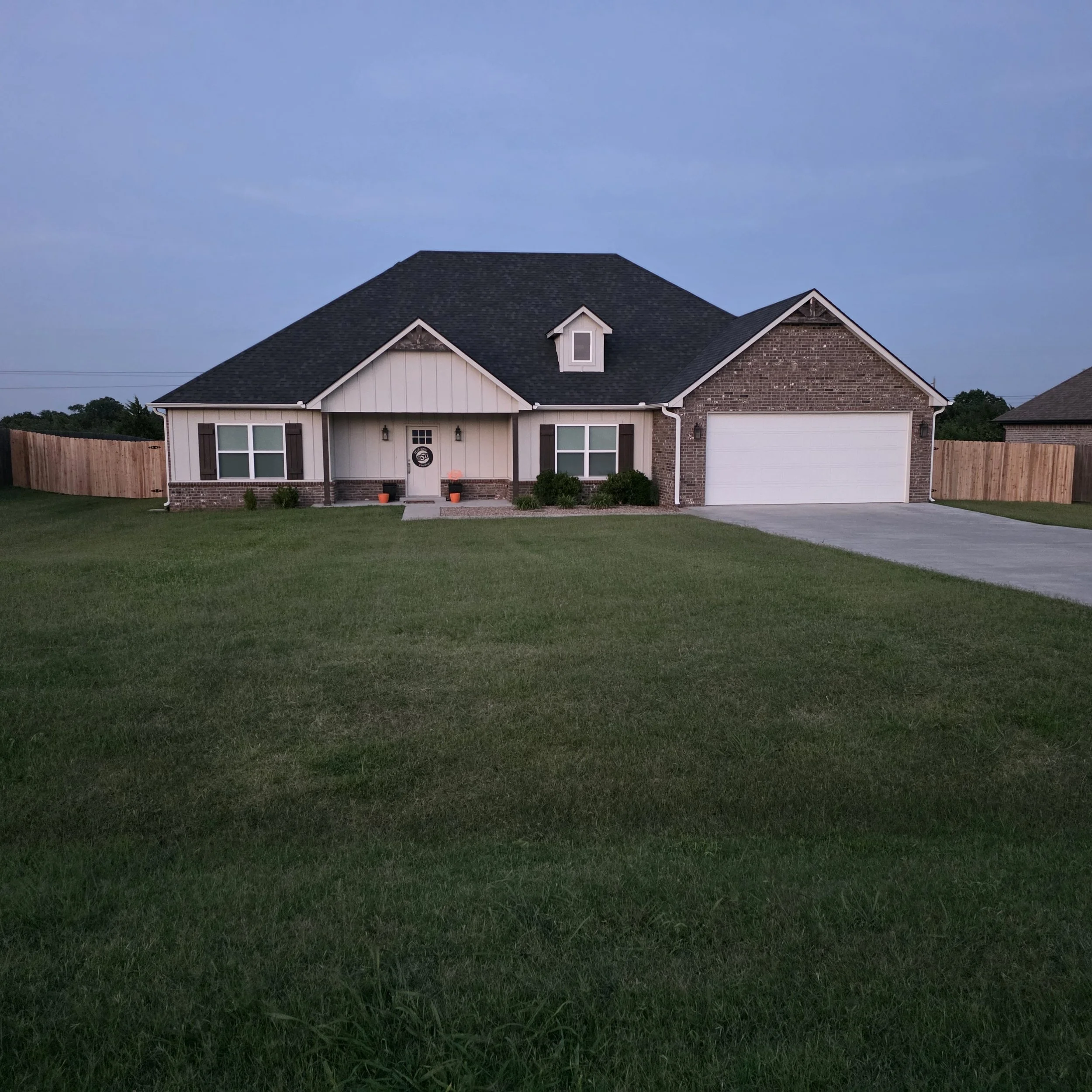 Enclosing a back yard giving great curb appeal in Stillwater, Oklahoma
