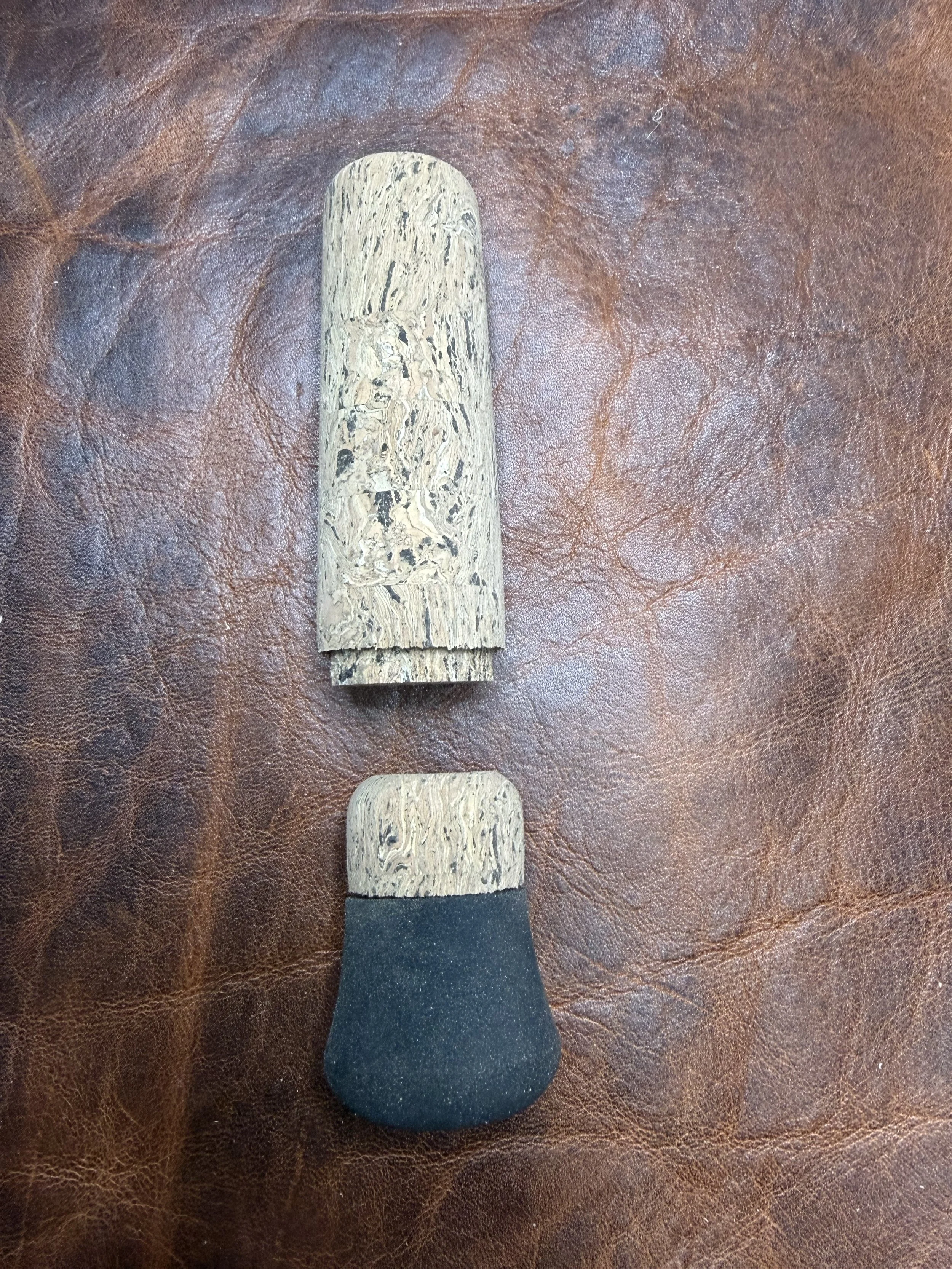 Custom cork grips glued and hand turned with rubber butt cap.