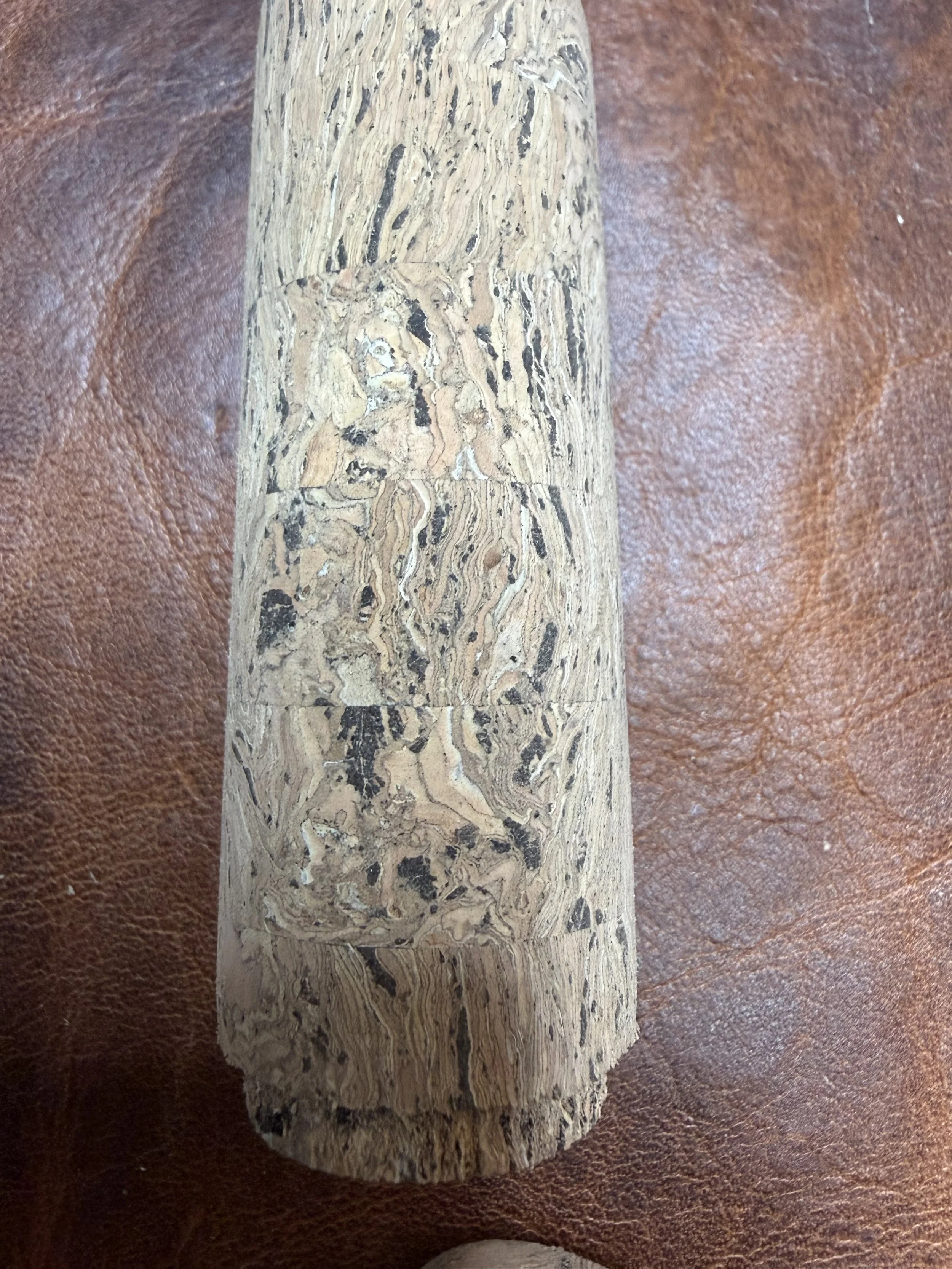Numerous types of cork with different color inlays.