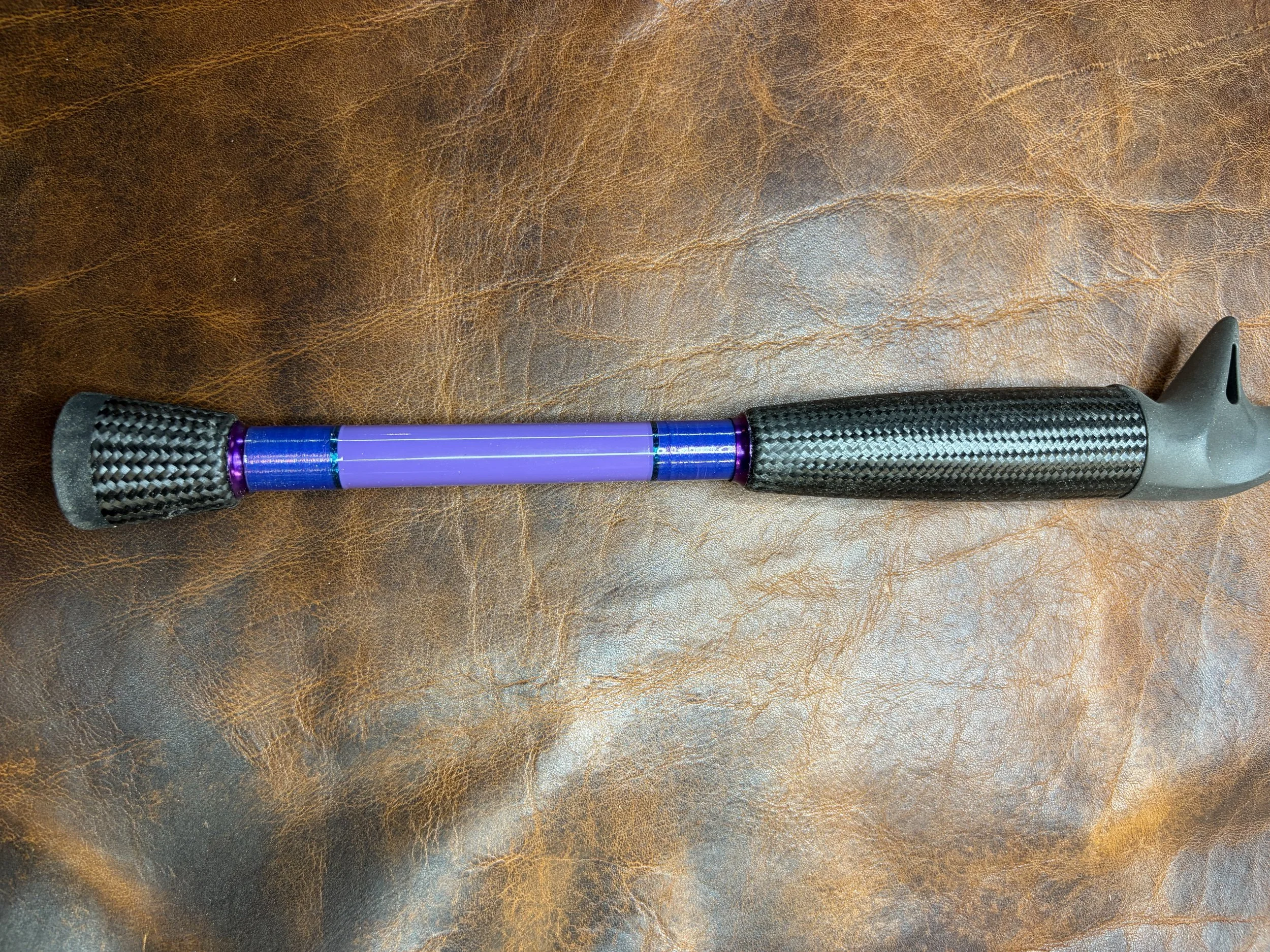 Carbon fiber split grip on high quality graphite blank.