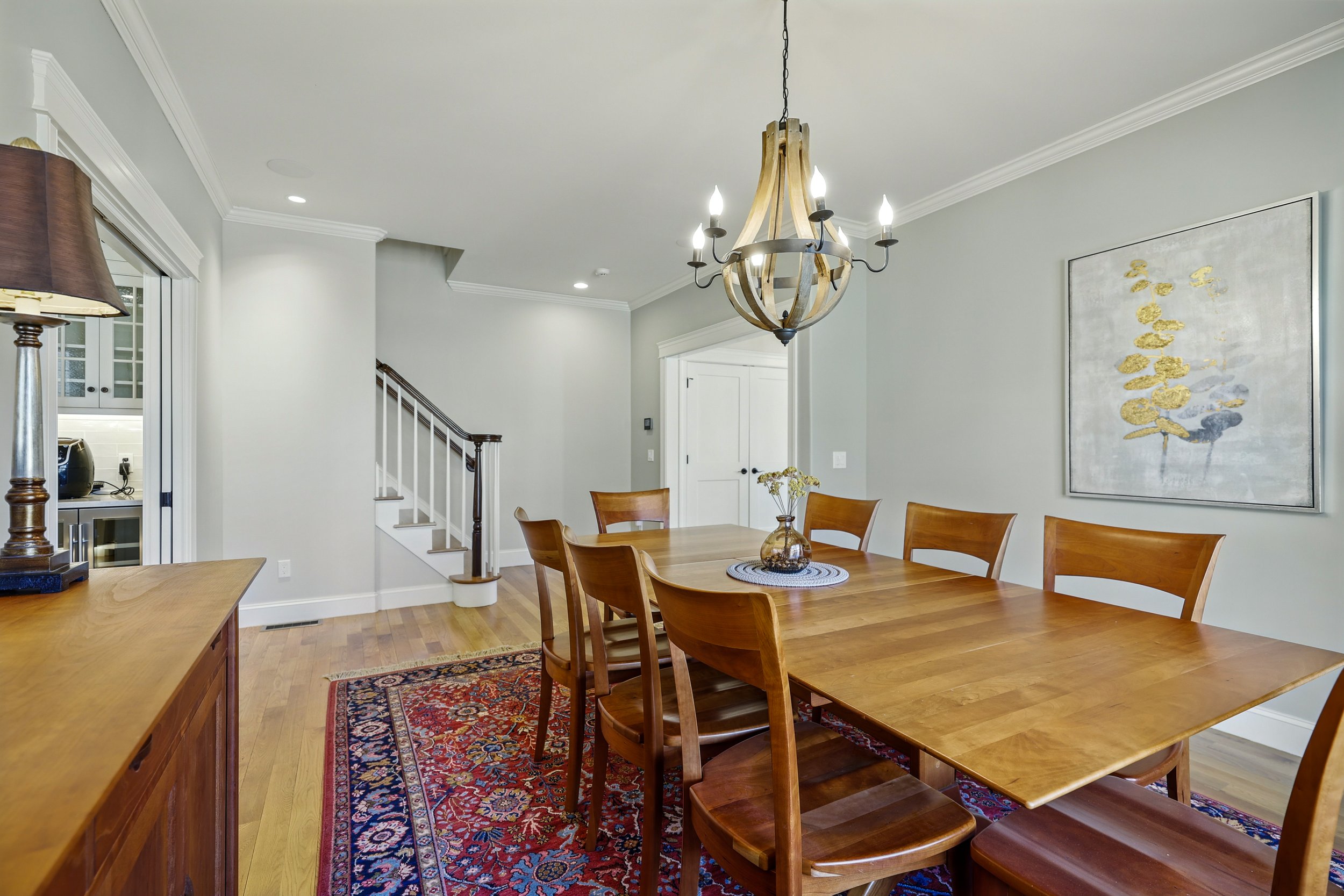 Dining area with hardwood floors and natural light in a Northampton, MA home.