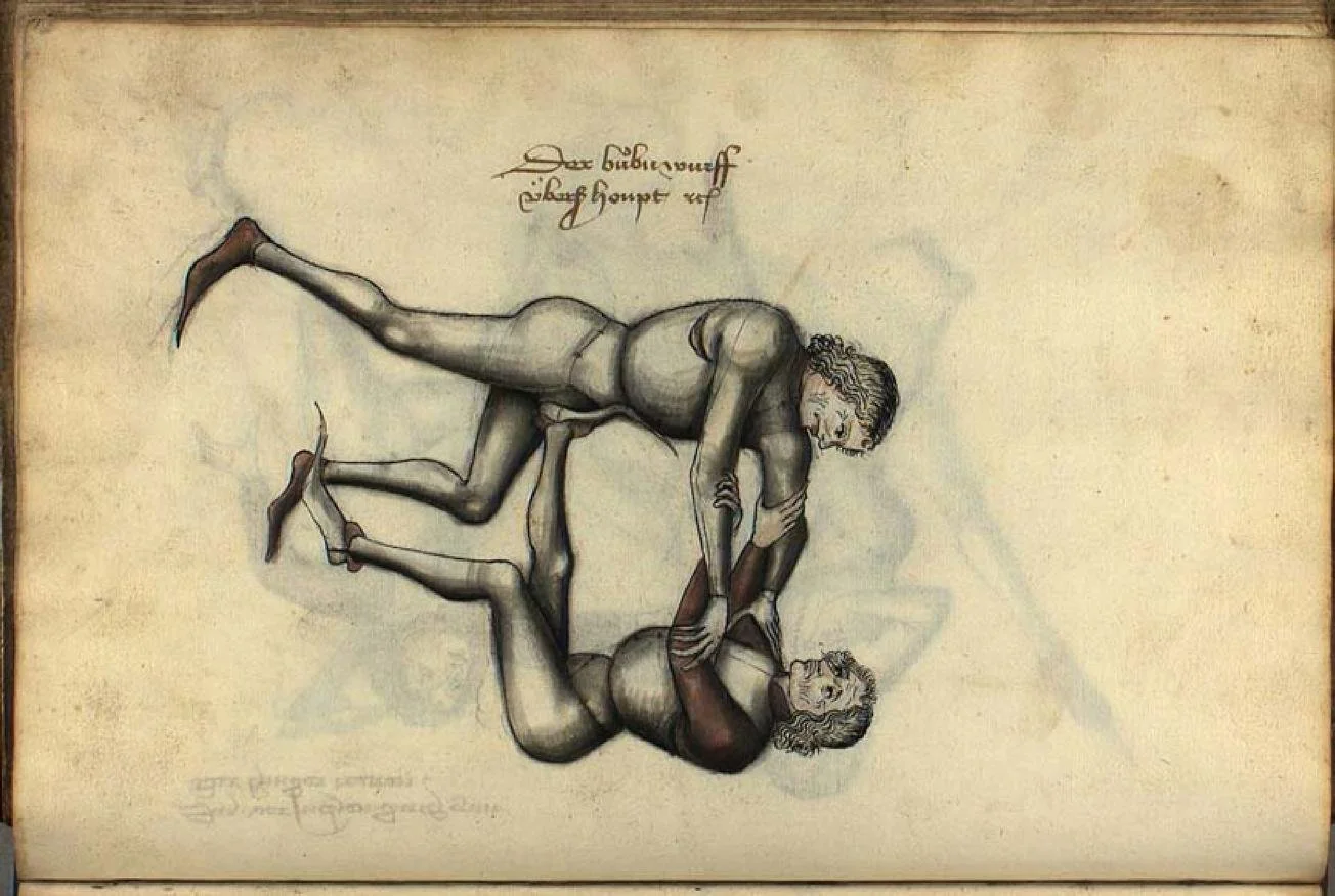 A historical illustration of two men engaged in a physical fight, with handwritten notes or annotations above.