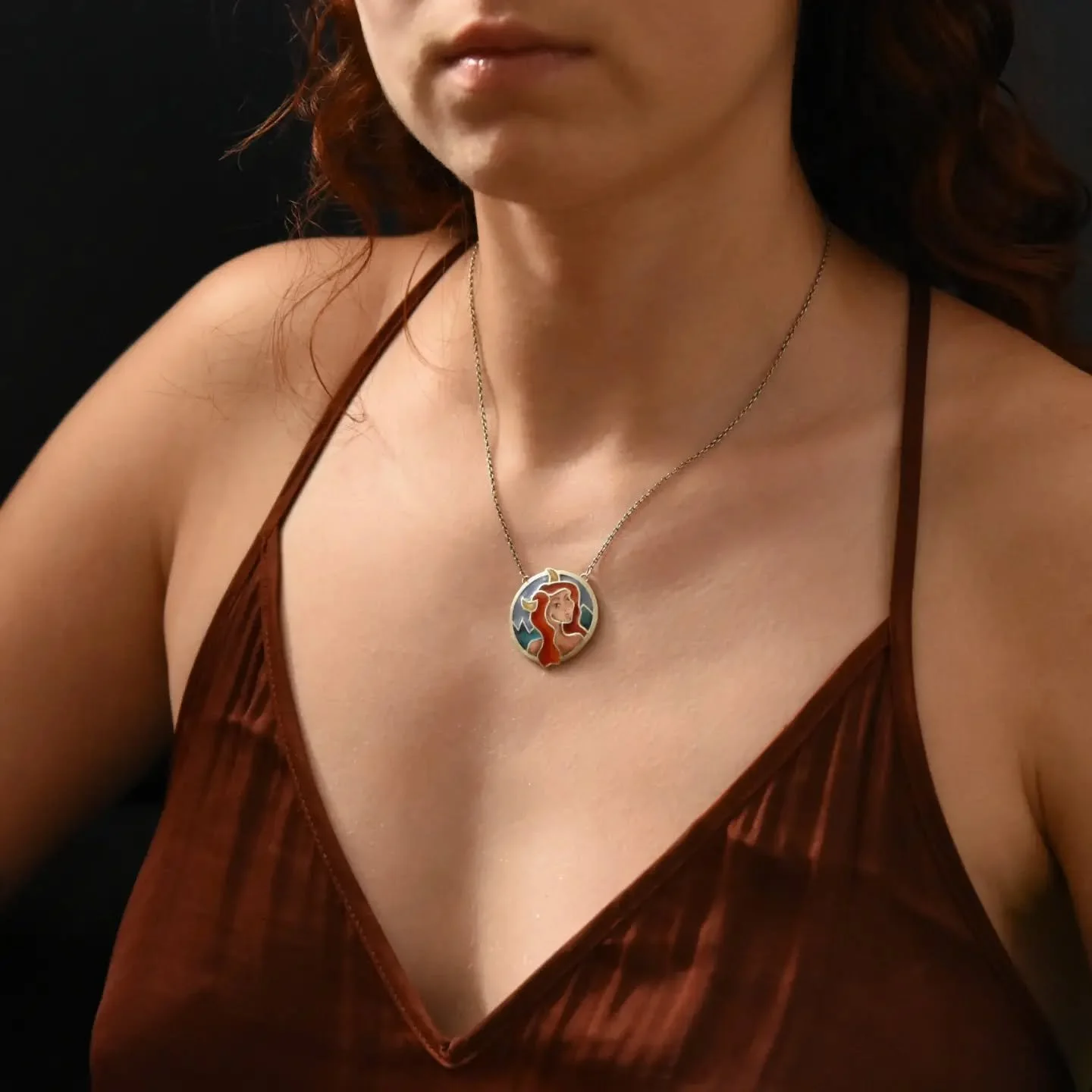 Handmade, hand-painted, and crafted in silver.
Each portrait is painted by hand, making every piece truly one of a kind.

Custom orders are available in your choice of colors and portrait. 🖤

Available at zariaritual.com
Jewelry as ritual.