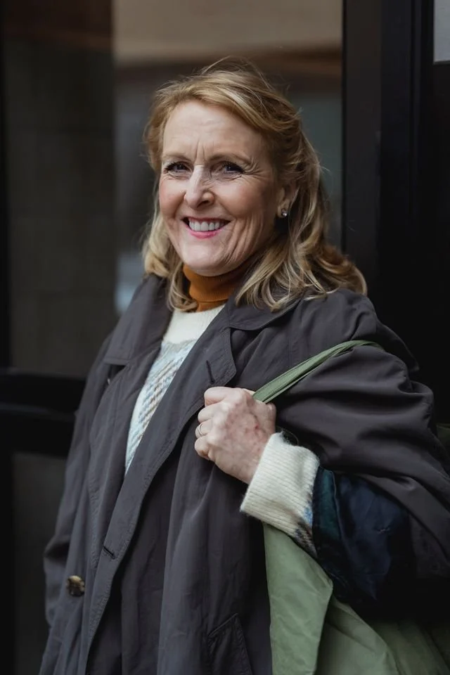 a woman smiling confidently