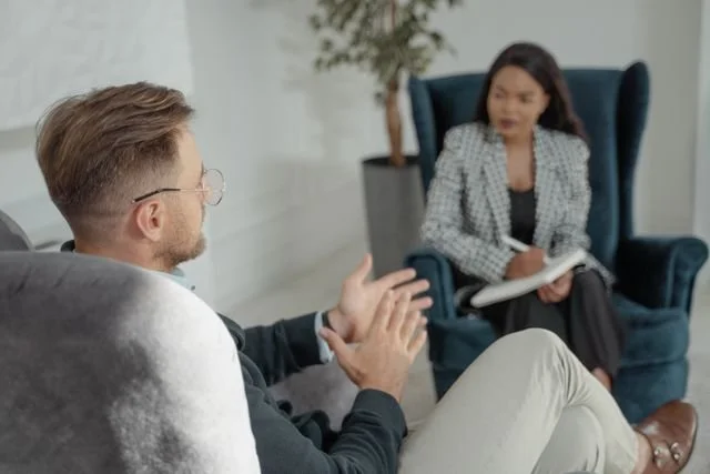 Therapy session with two people