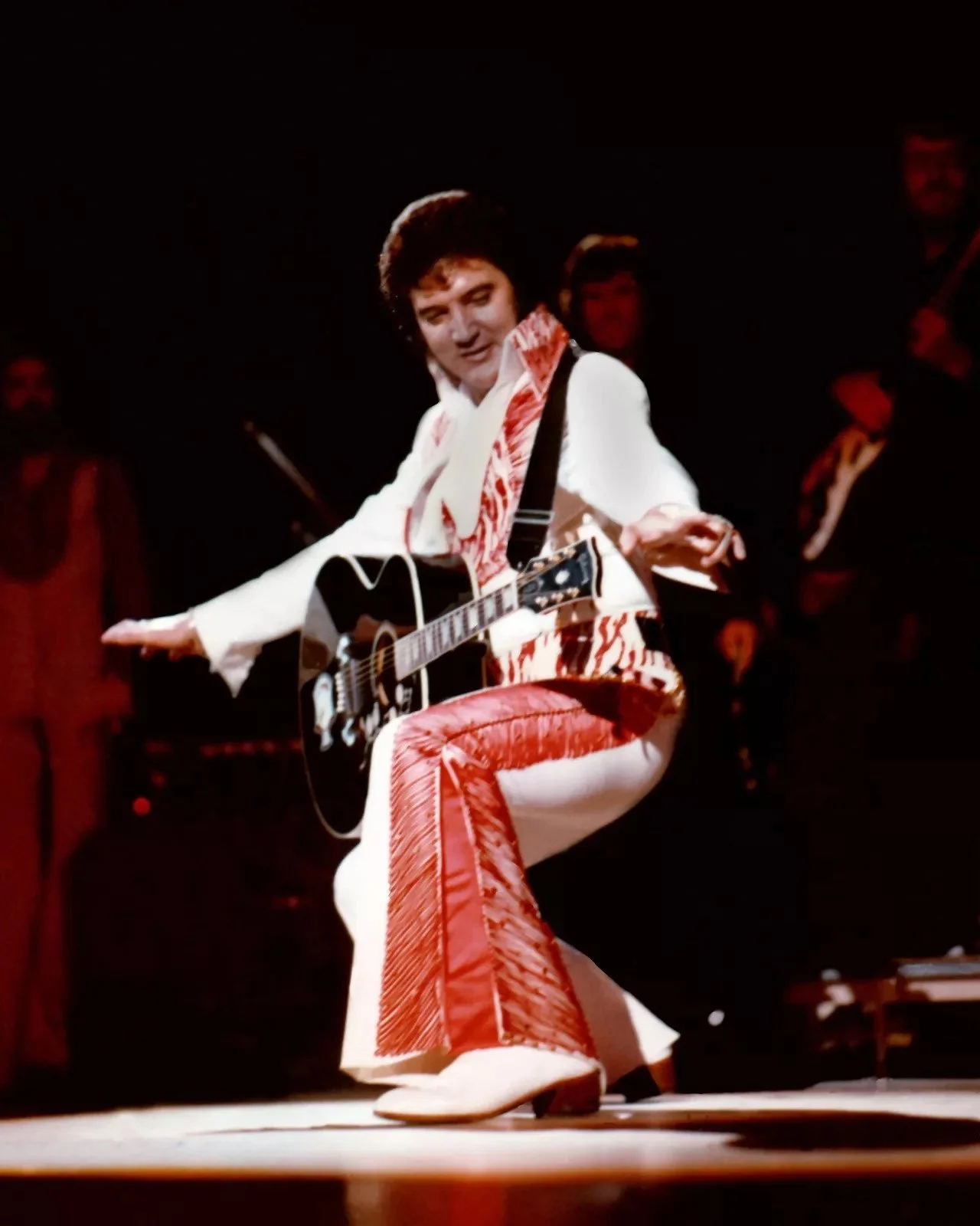 Elvis Presley Posing With The Guitar.jpg