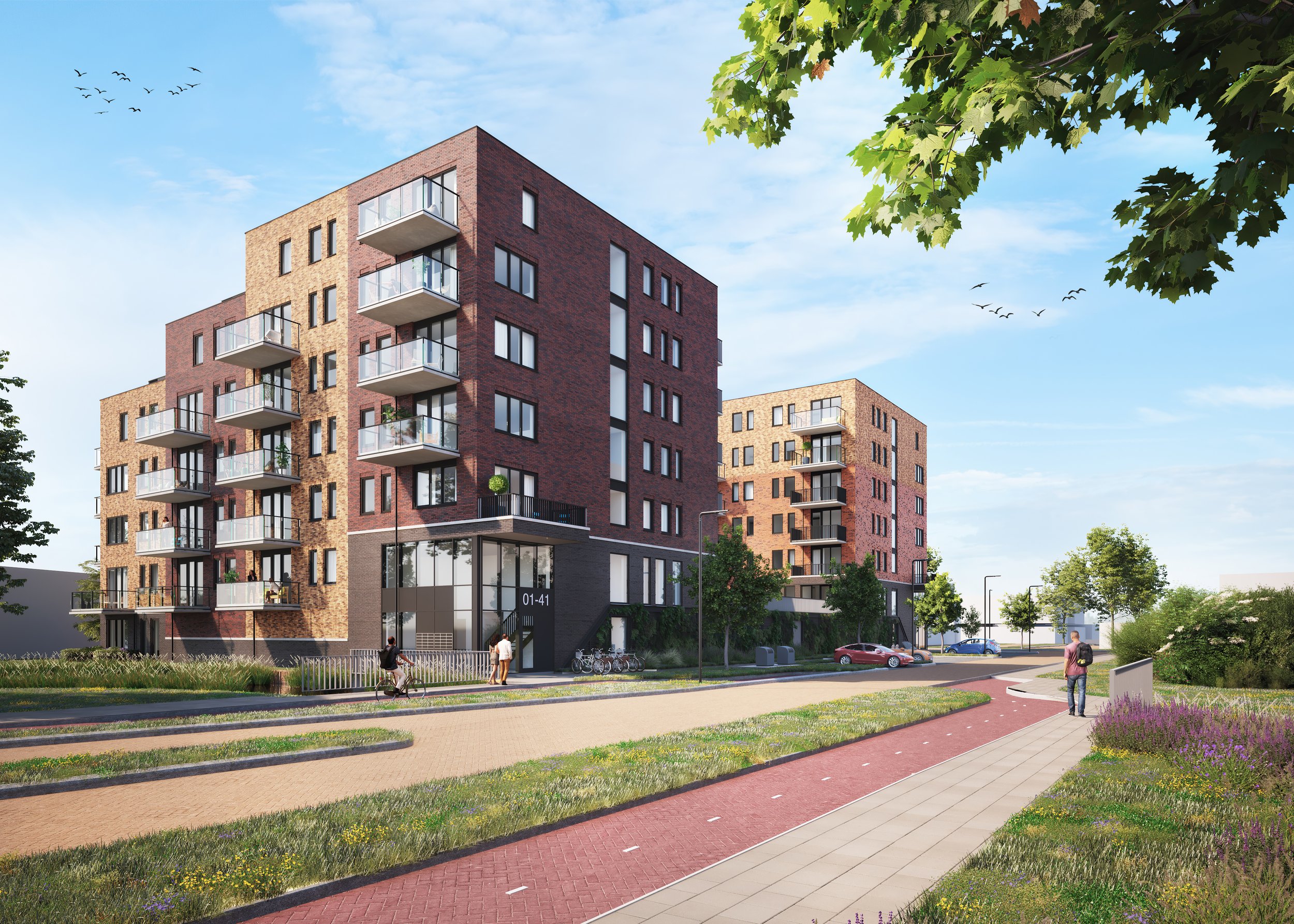 Moderne appartementencomplexen met balkons, omgeven door groen en een voetgangerspad, in een stadsomgeving bij daglicht.