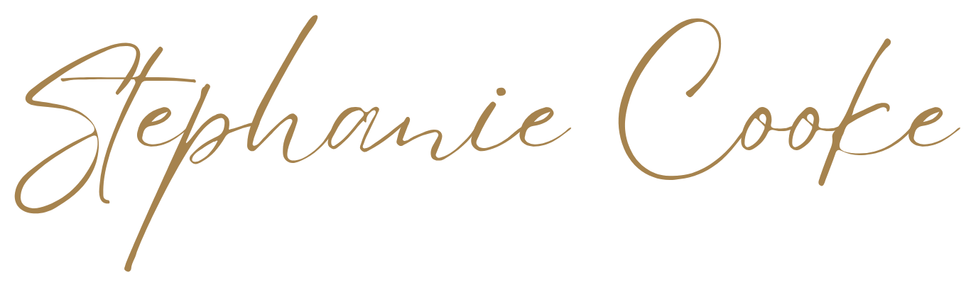 Handwritten text that says 'Stephanie Cooke' in cursive, brown ink on a black background.