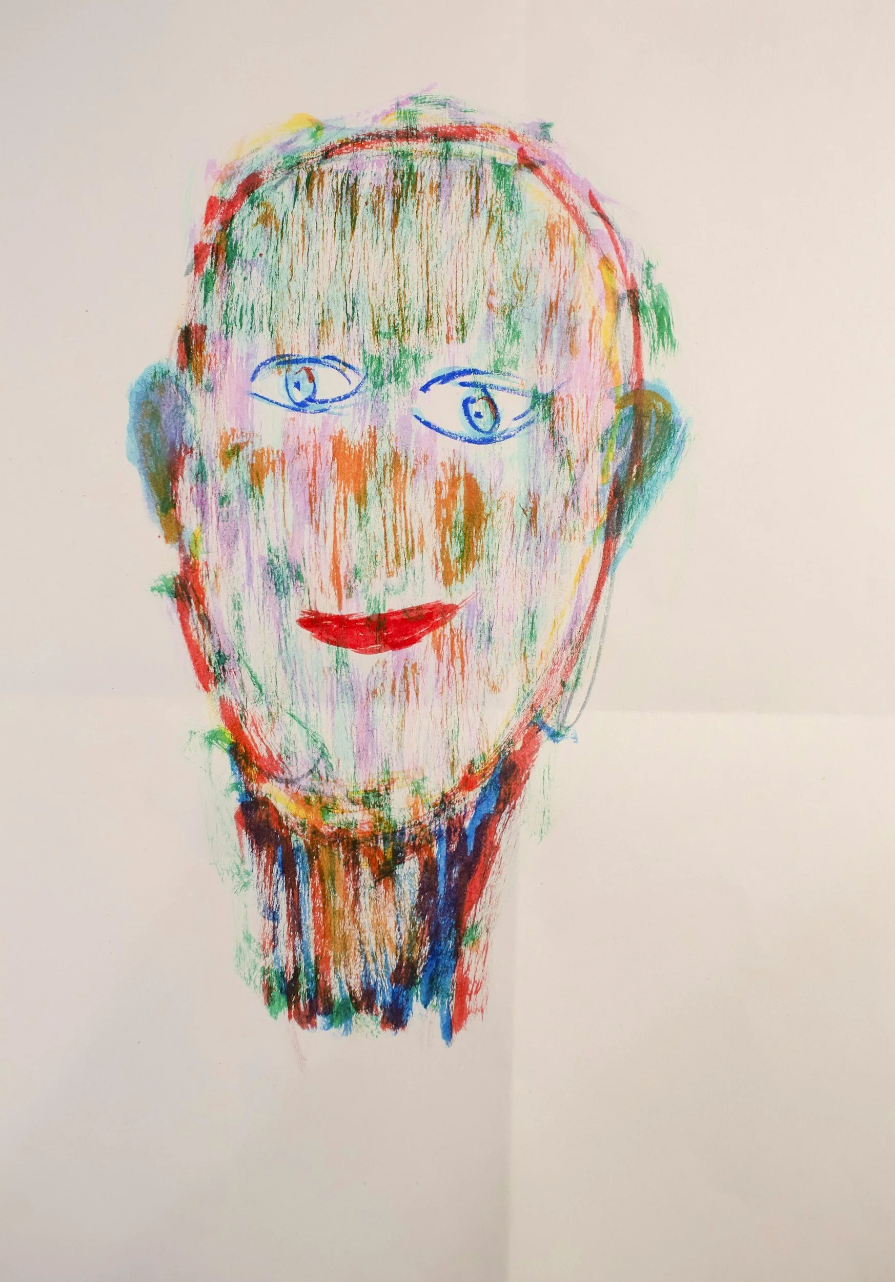 Colorful abstract drawing of a face with blue eyes, red lips, and multicolored hair on white paper.