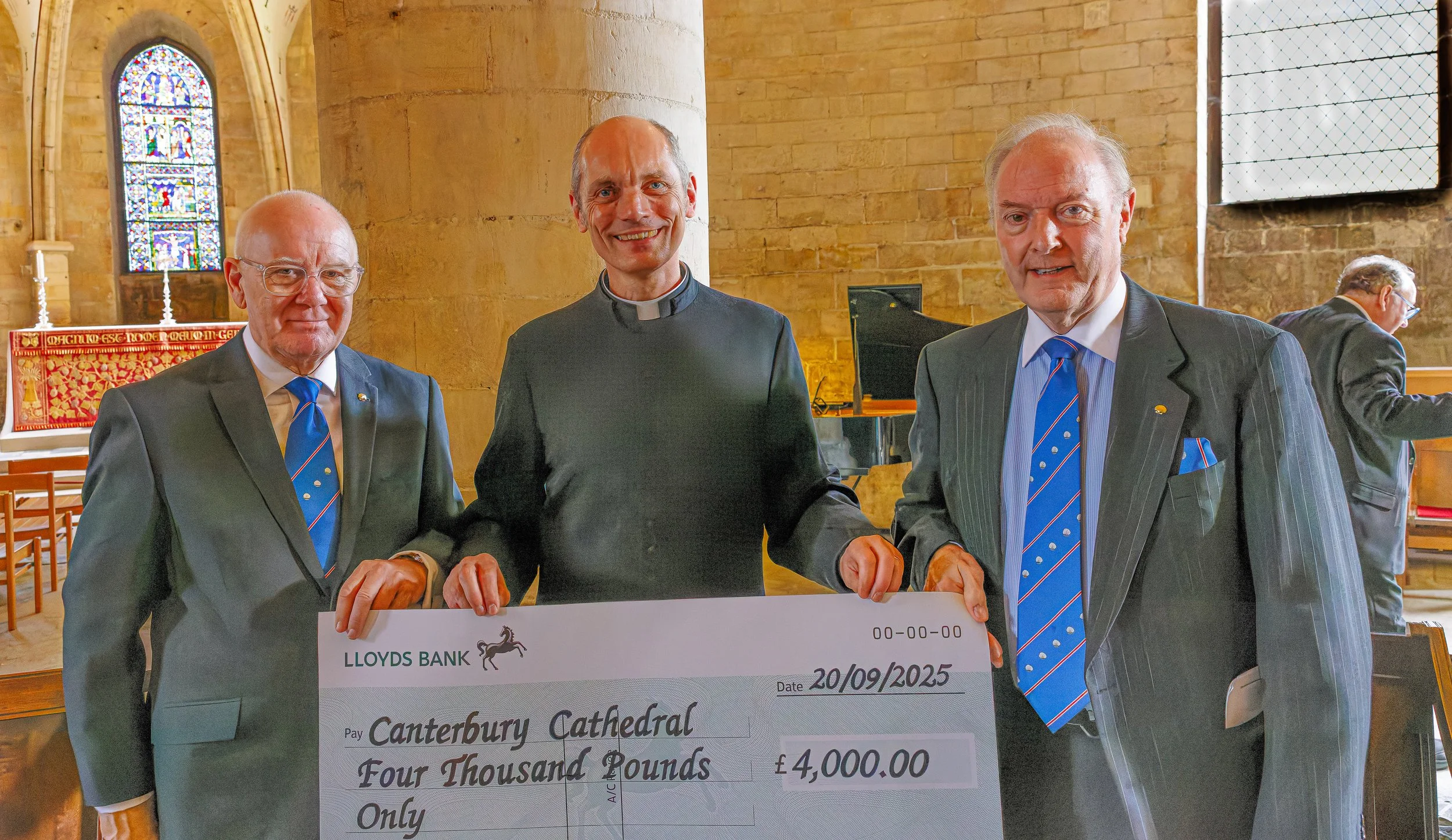 Rt Worthy Grand Master Sir Philip of Hamilton and the Grand Prior Sir Harry of Benfro presenting a cheque from the Order to Canterbury Cathedral
