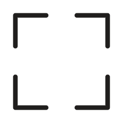 A black square with four semi-circular edges inside a camera viewfinder outline, indicating a focusing symbol.