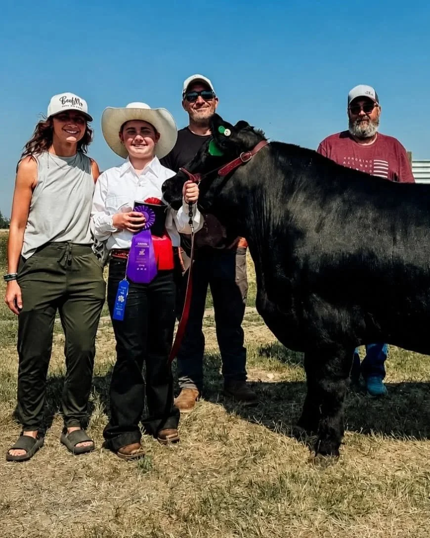 Math Farms family with registered Angus show cattle in Montana