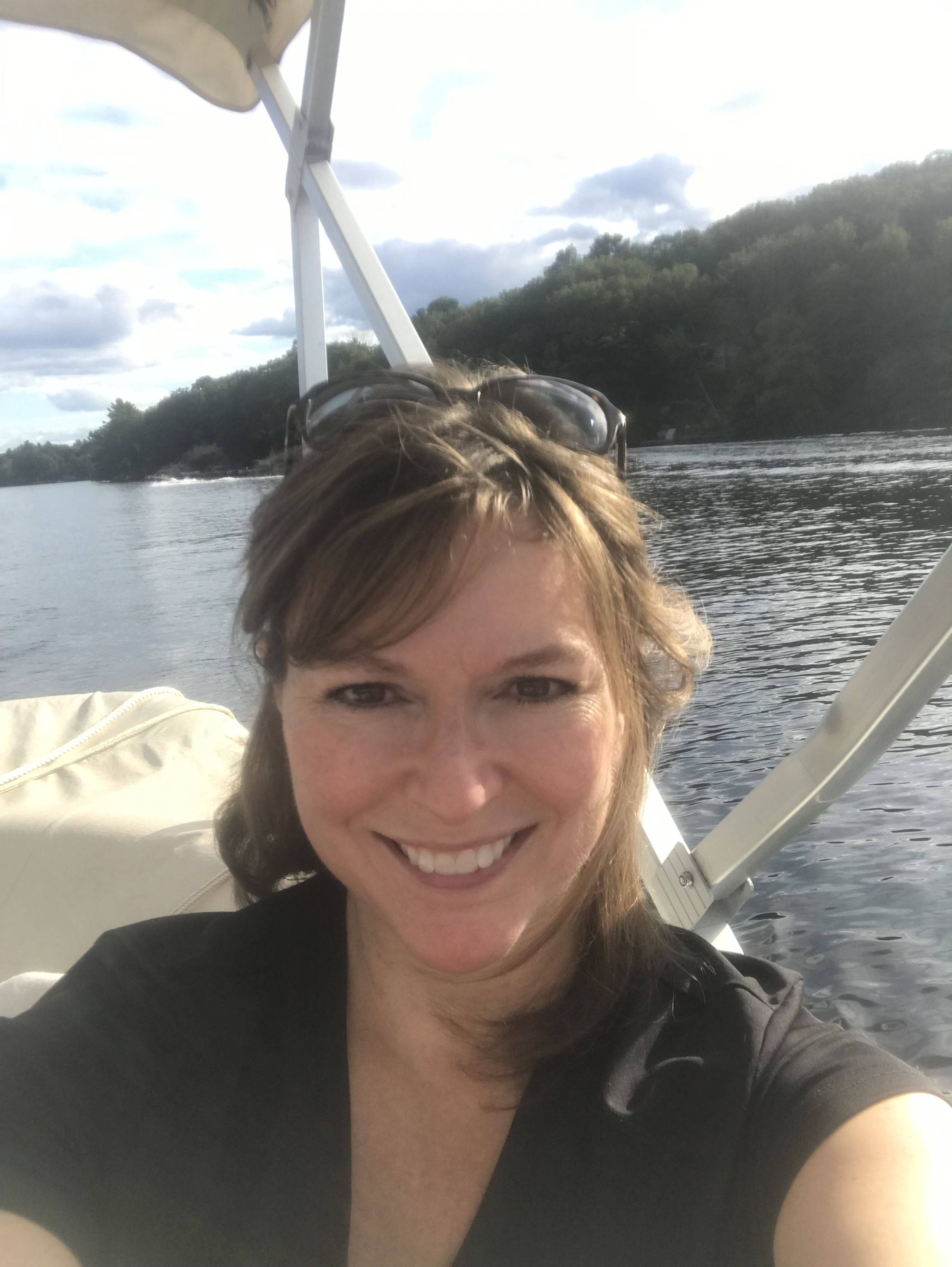 Karen Renaud, founder of inSPIREd Integrative Health, enjoying time outdoors on the water.