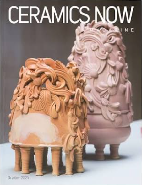 Cover of Ceramics Now magazine featuring two lion head-shaped ceramic sculptures, one in terracotta and the other in pale pink.