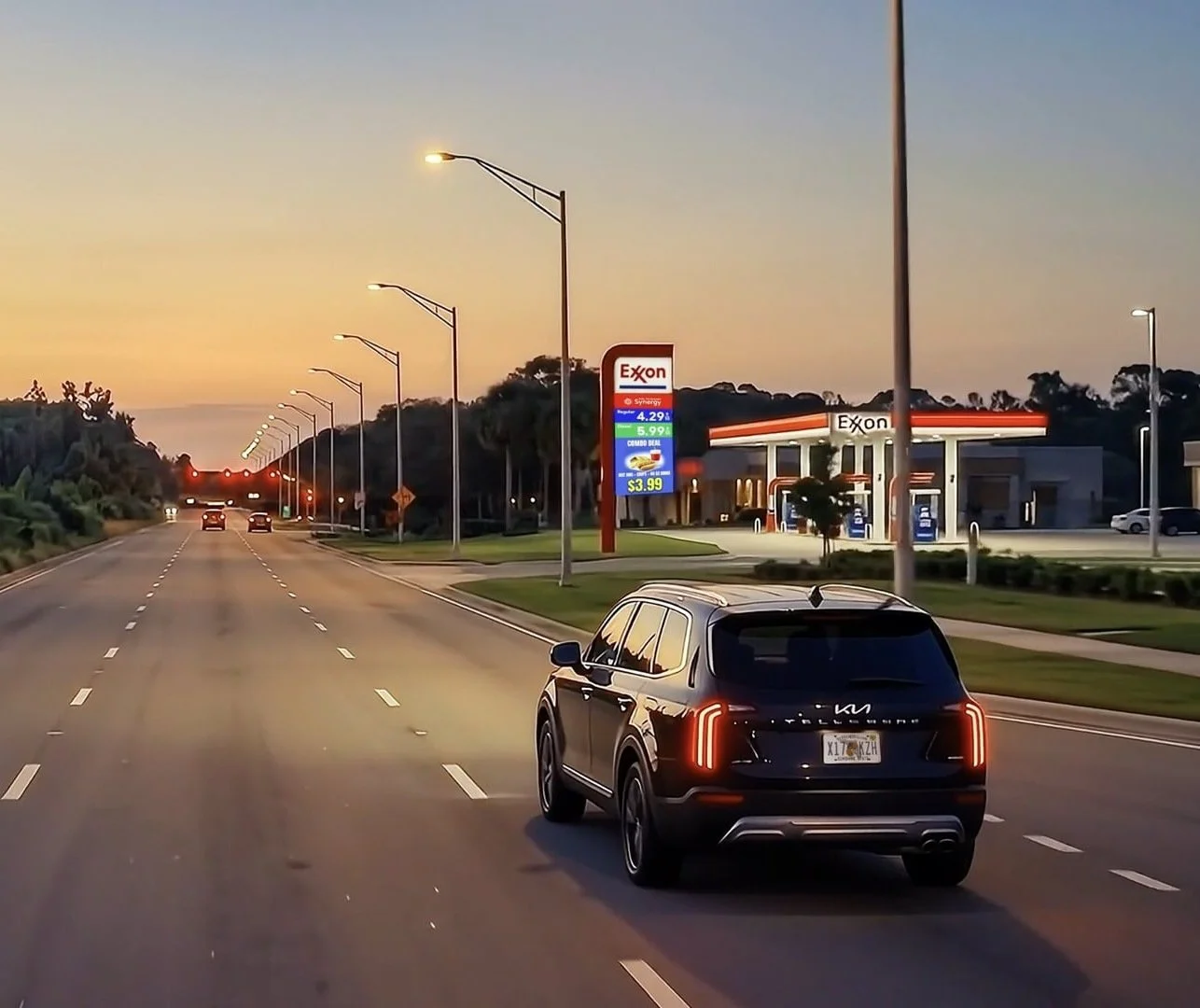 SUV driving down a dusk highway toward a fuel station, from an AI-generated trade show video