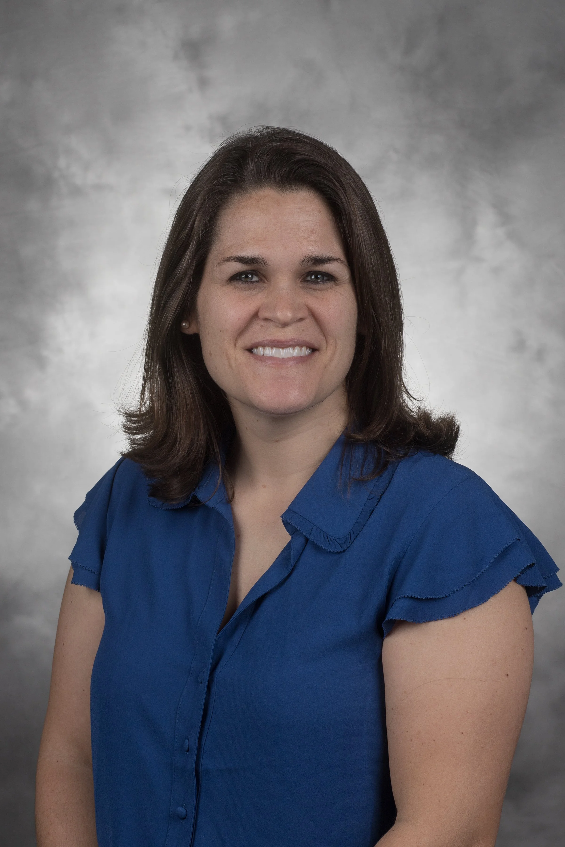 headshot of Michelle Overman, LMFT, CMPC.