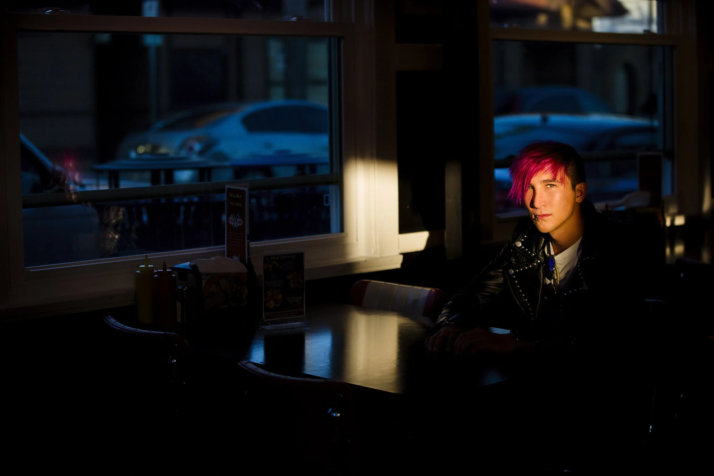 High school senior portrait photographed at Cool Cat Cafe in Pismo Beach, California.