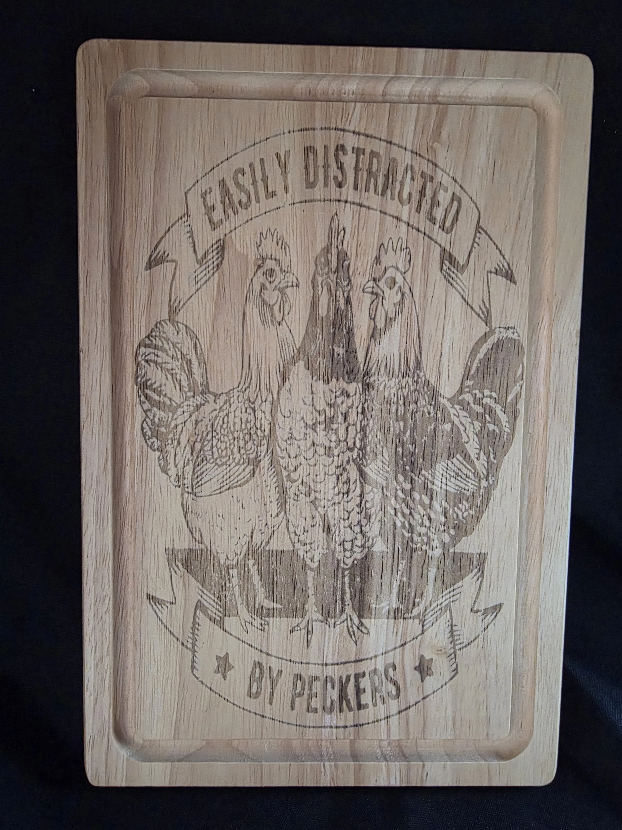 Easily Distracted by Peckers Wooden Chopping Board