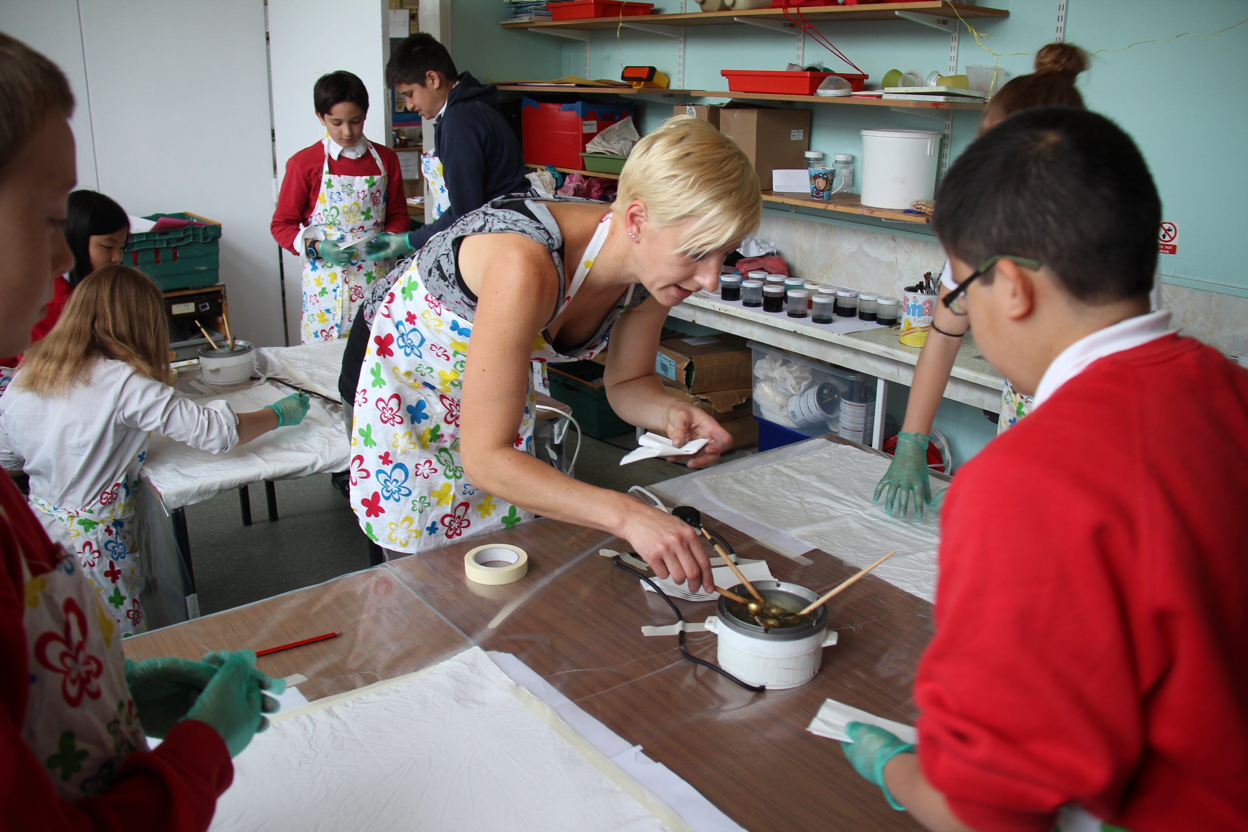 Emily Cooling leading a hands-on participatory art workshop with young people.