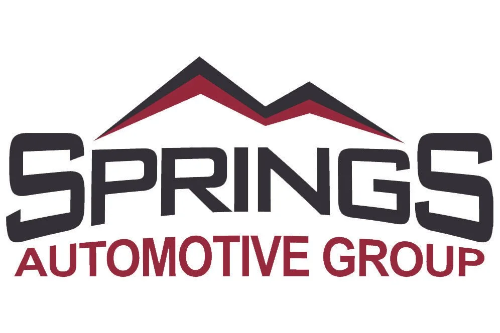 Logo for Springs Automotive Group featuring stylized mountain peaks above the company name in bold black and red lettering.