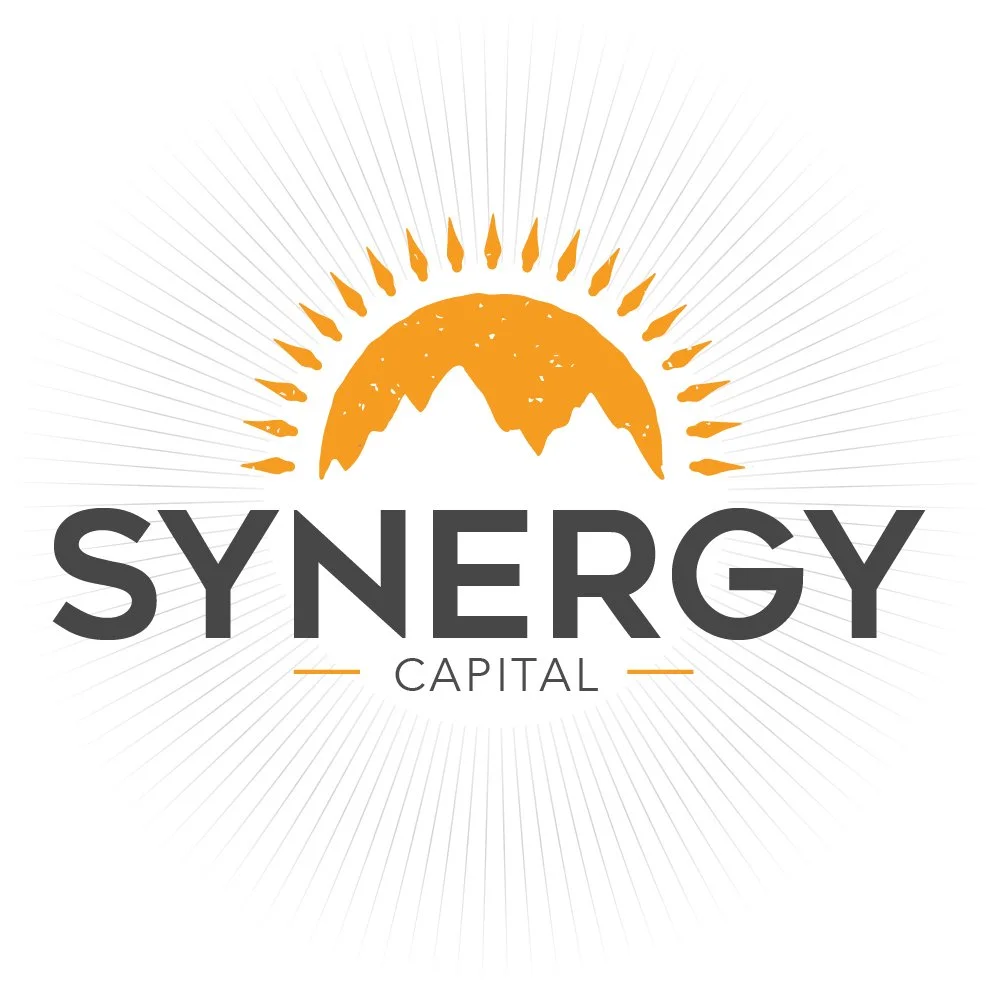 Logo for Synergy Capital featuring an orange sun with mountain peaks and rays, and the words "SYNERGY CAPITAL" underneath.