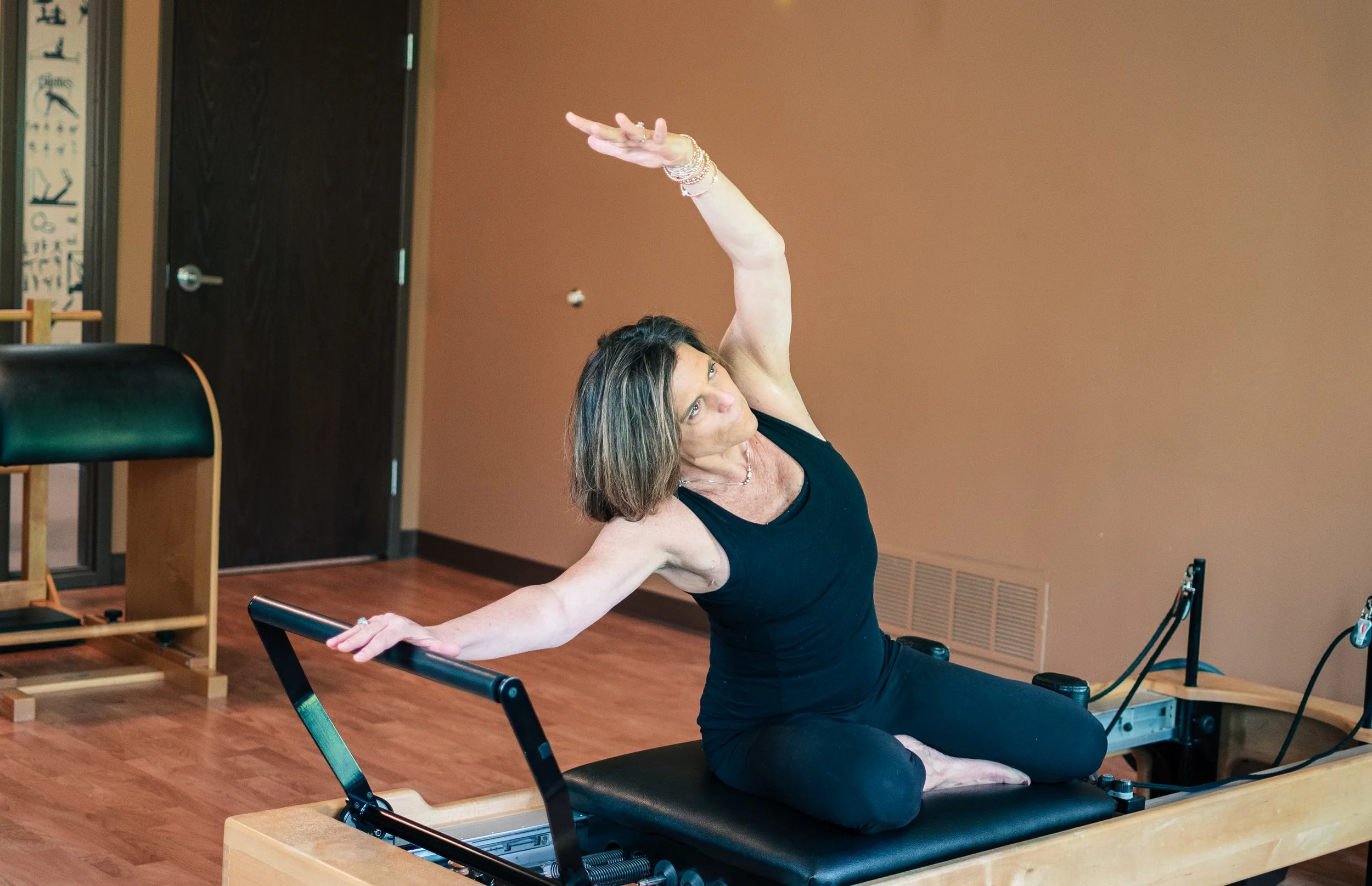 Rebecca Bell is a Master Teacher Trainer for EYT pilates in Fort Wayne, Indiana at Mindful Movements Pilates Studio teaching a teacher training program for pilates reformer and pilates mat