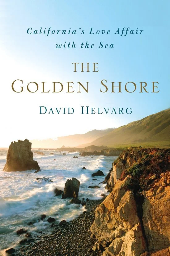 Book cover titled 'The Golden Shore' by David Helvarg, featuring a coastal landscape with waves crashing against rocks and cliffs at sunset.