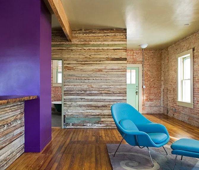 Living room with salvaged bead-board siding, residential loft, "El Picoso", San Antonio, Texas, 2008. Photo by Chris Cooper Photography