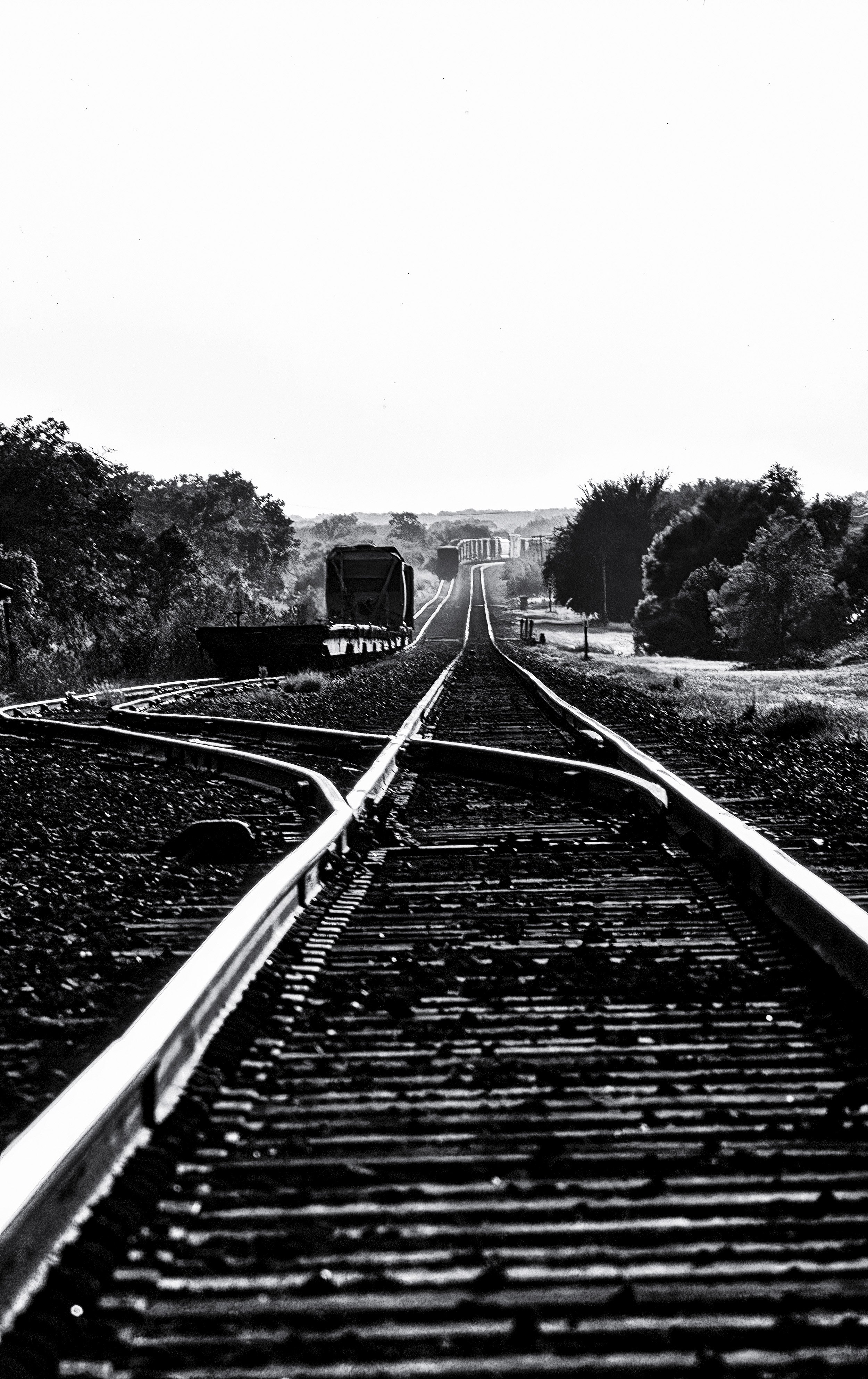 "Crossroads of Steel"- Rail lines stretch across the Hill Country of West Texas—a quiet study in distance, solitude, and the rhythm of time.