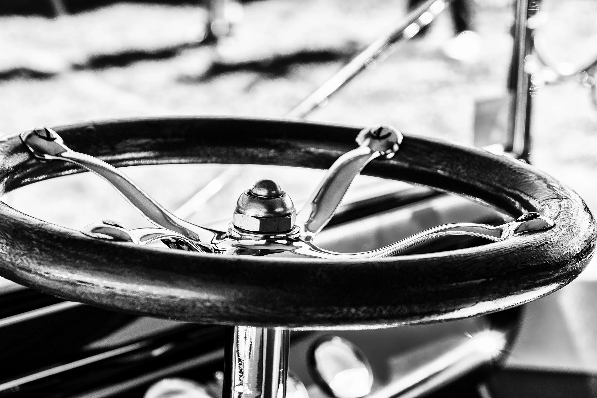 "Turning Time"- A close-up of an iconic antique steering wheel, from a bygone era, on display at a car show in Colorado.