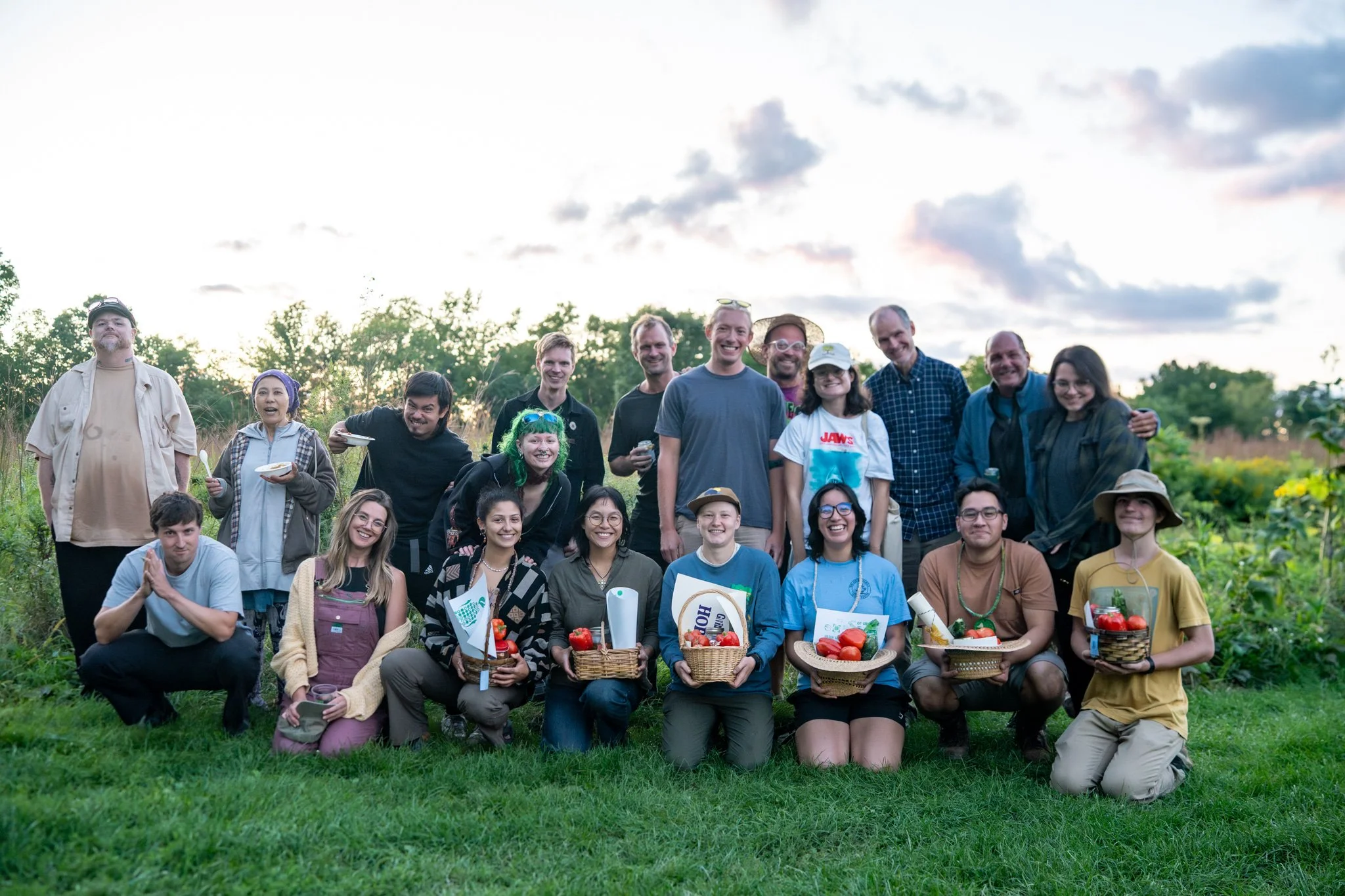 Brainplate Grows Compost Olympics participants gather for a group photograph with their produce prizes.