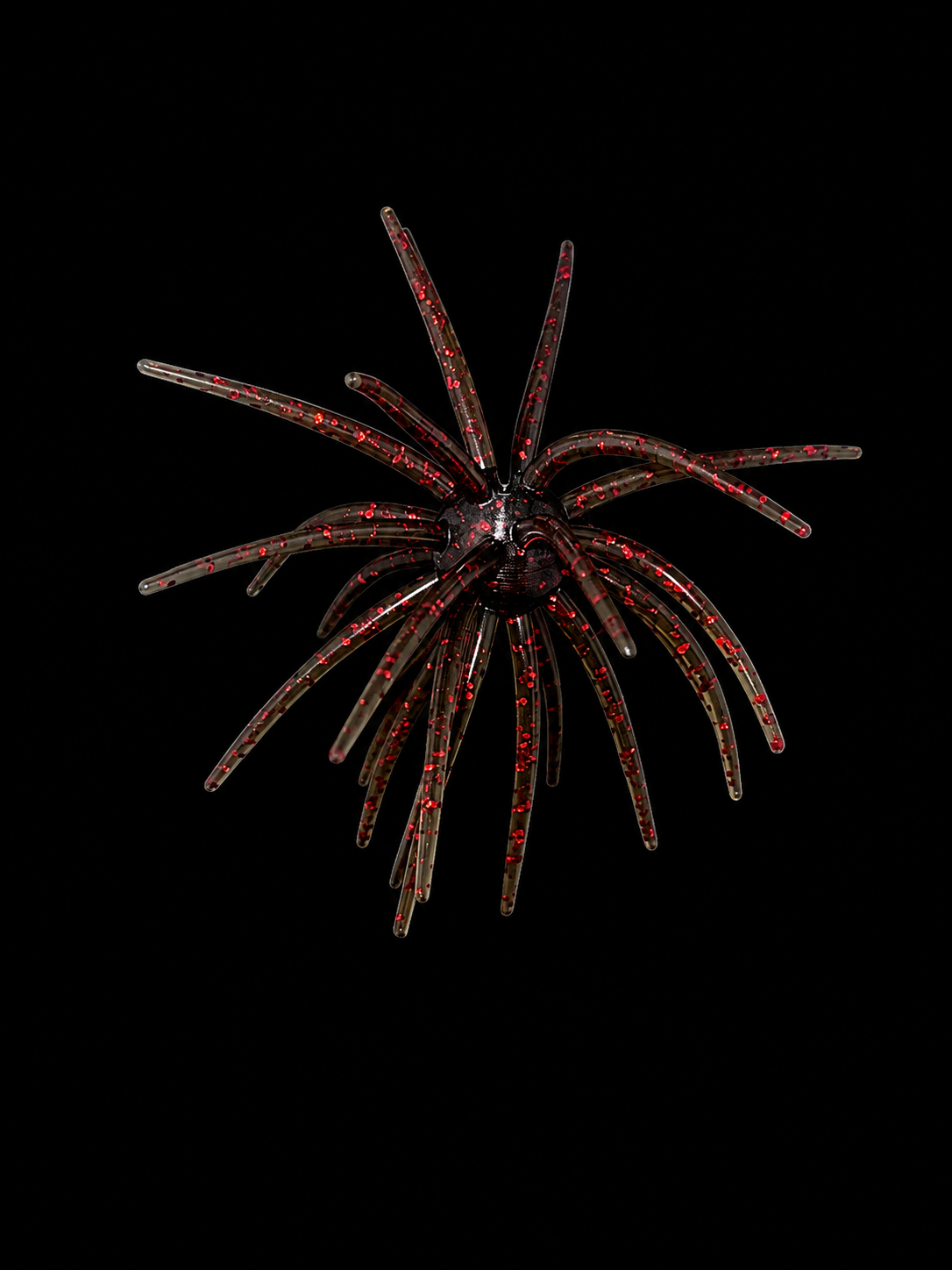 Translucent custom fishing Urchin lure with red and black speckles.