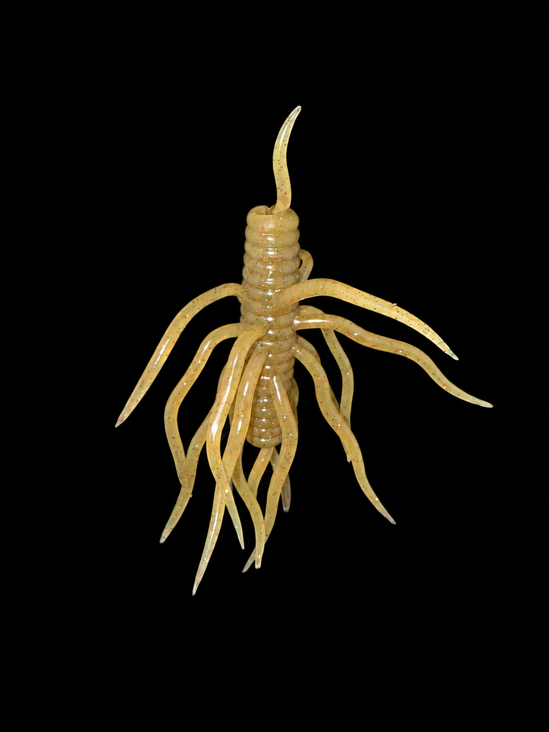 Orange Crazy Critter centipede-style fishing bait on a black background.