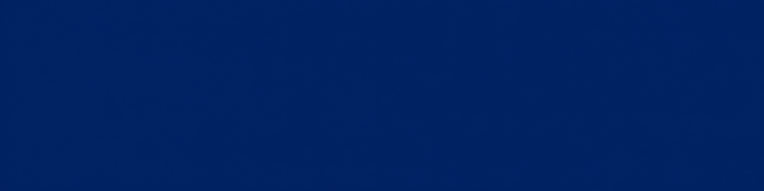 A clear blue sky with no visible objects or features.