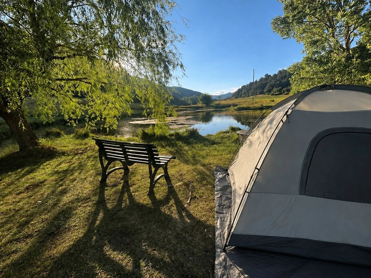 edited guest 7 - gray-red tent near pond.jpg