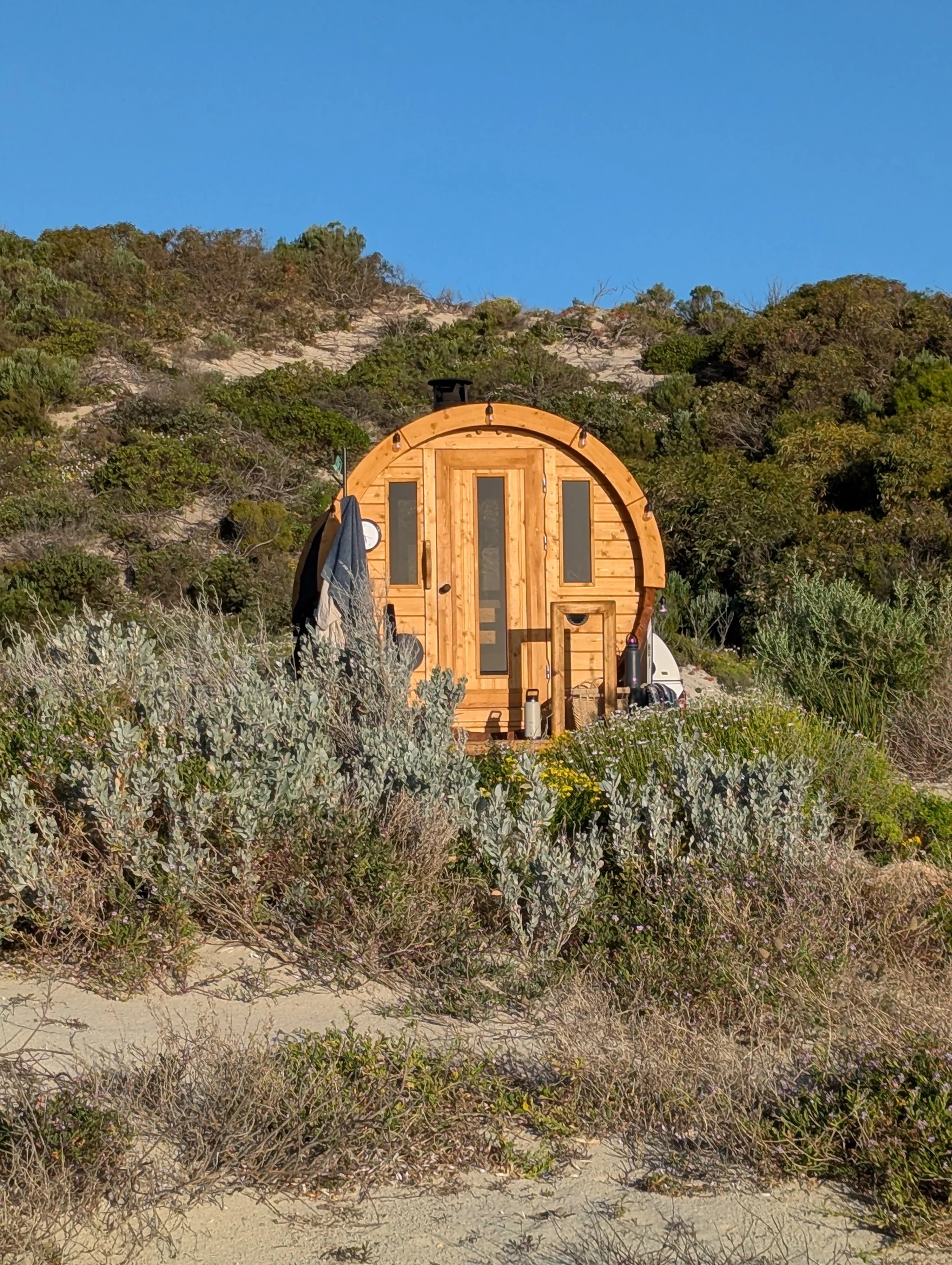 sauna with sand dunes in the background
