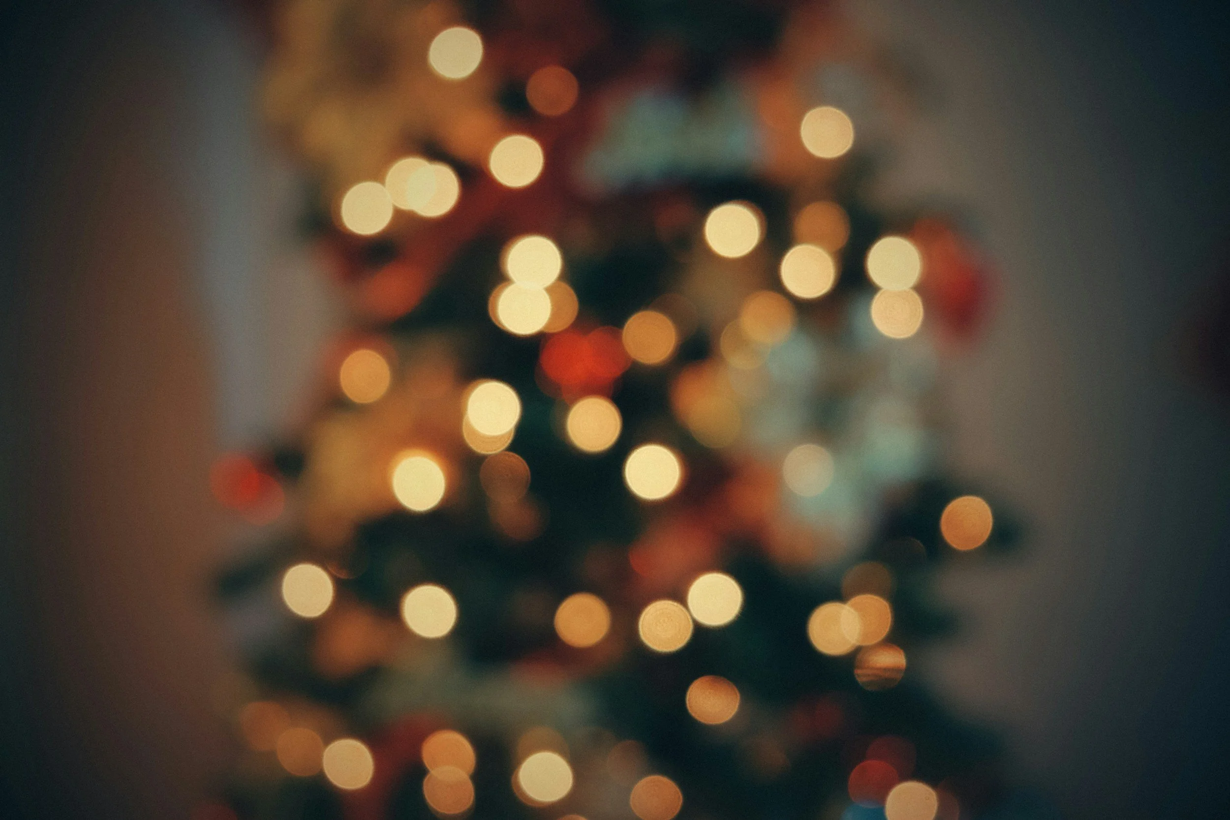 Blurred image of multicolored holiday or Christmas lights.