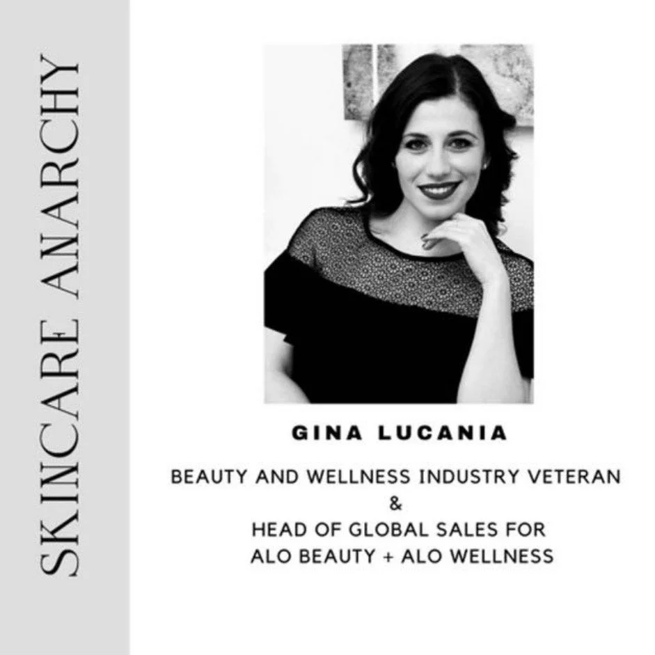 Black and white professional photo of Gina Lucania, smiling, with text indicating her as a veteran in the beauty and wellness industry, and head of global sales for ALO Beauty and ALO Wellness.