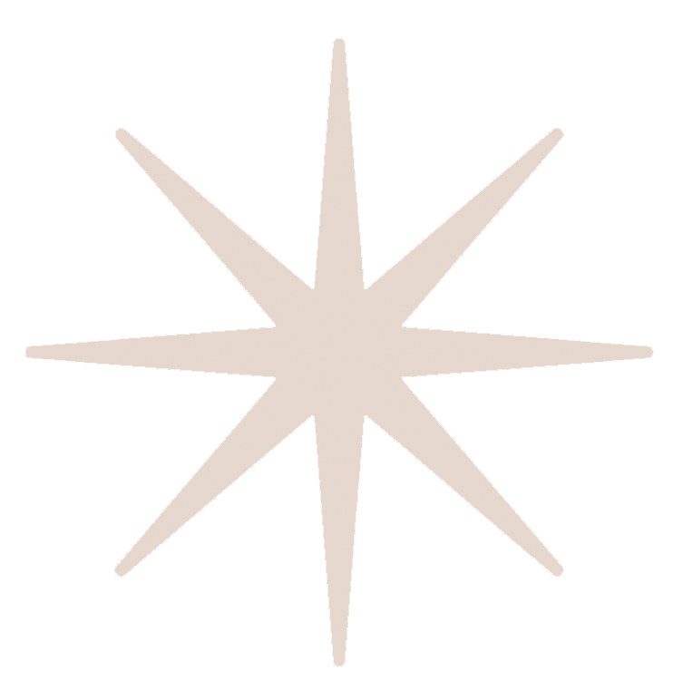 An eight-pointed star-shaped decoration or light fixture with elongated points on a black background.