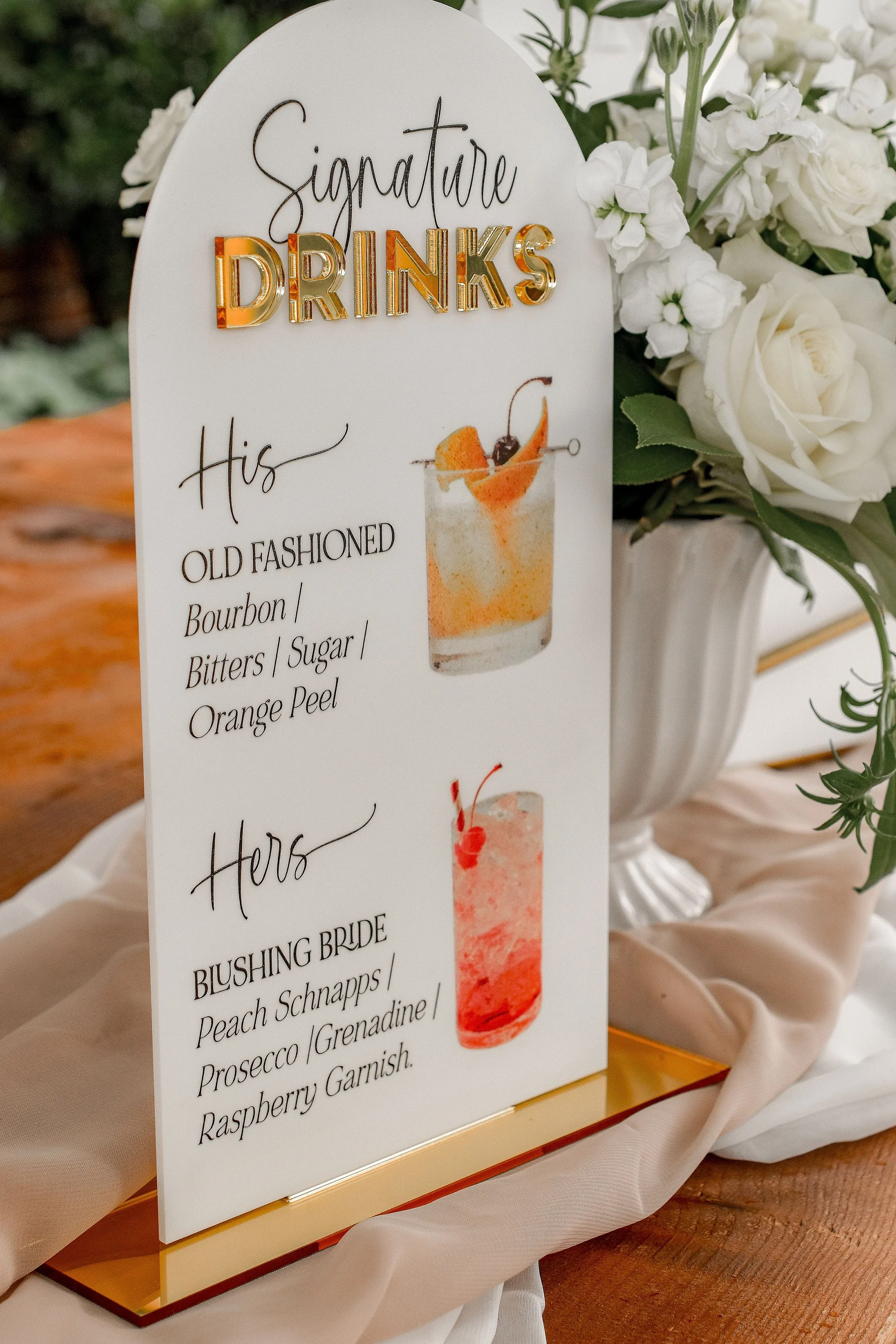 Large personalised cocktail sign displaying three illustrated wedding drinks