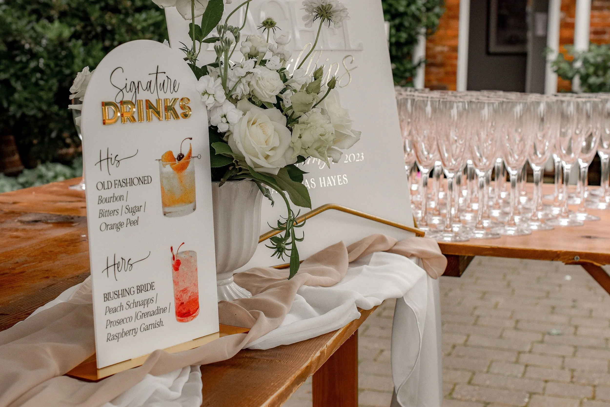 Custom Signature Drinks menu styled on an elegant wedding bar